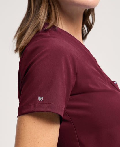 Jaanuu Harlow Slim 1-Pocket Scrub Top in Burgundy, product photo 4 of 6