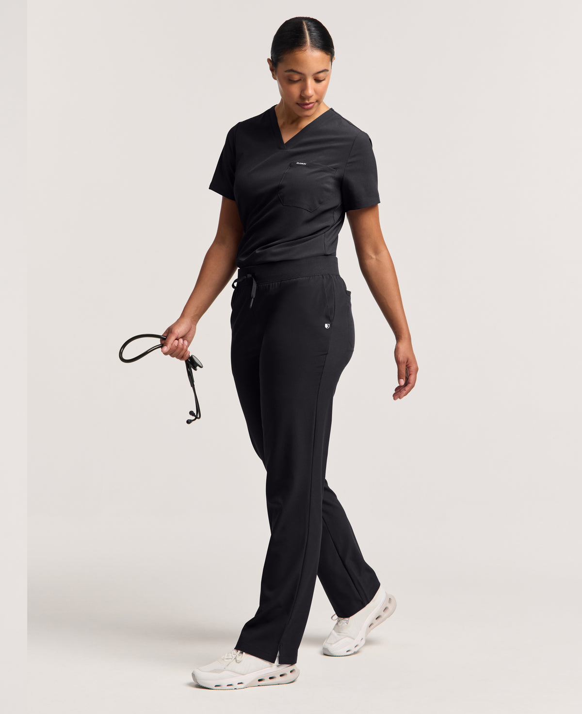 Jaanuu Harlow Slim 1-Pocket Scrub Top in Black, product photo 6 of 6
