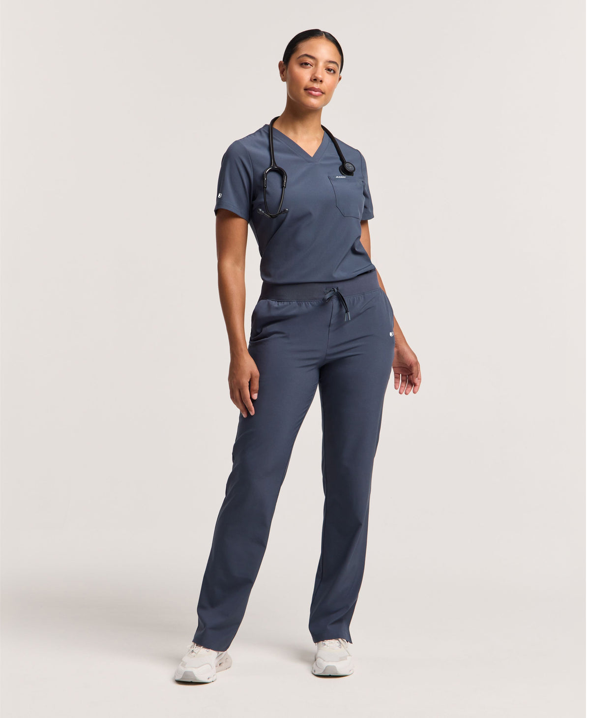 Jaanuu Harlow Slim 1-Pocket Scrub Top in Carbon Gray, product photo 1 of 6