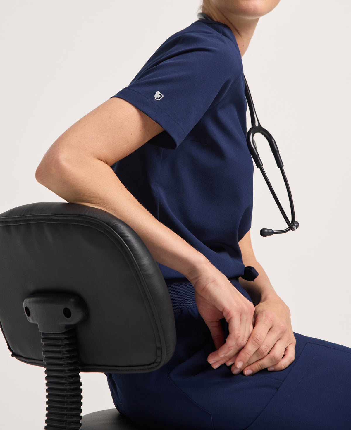 Jaanuu Harlow Slim 1-Pocket Scrub Top in Midnight Navy, product photo 4 of 6