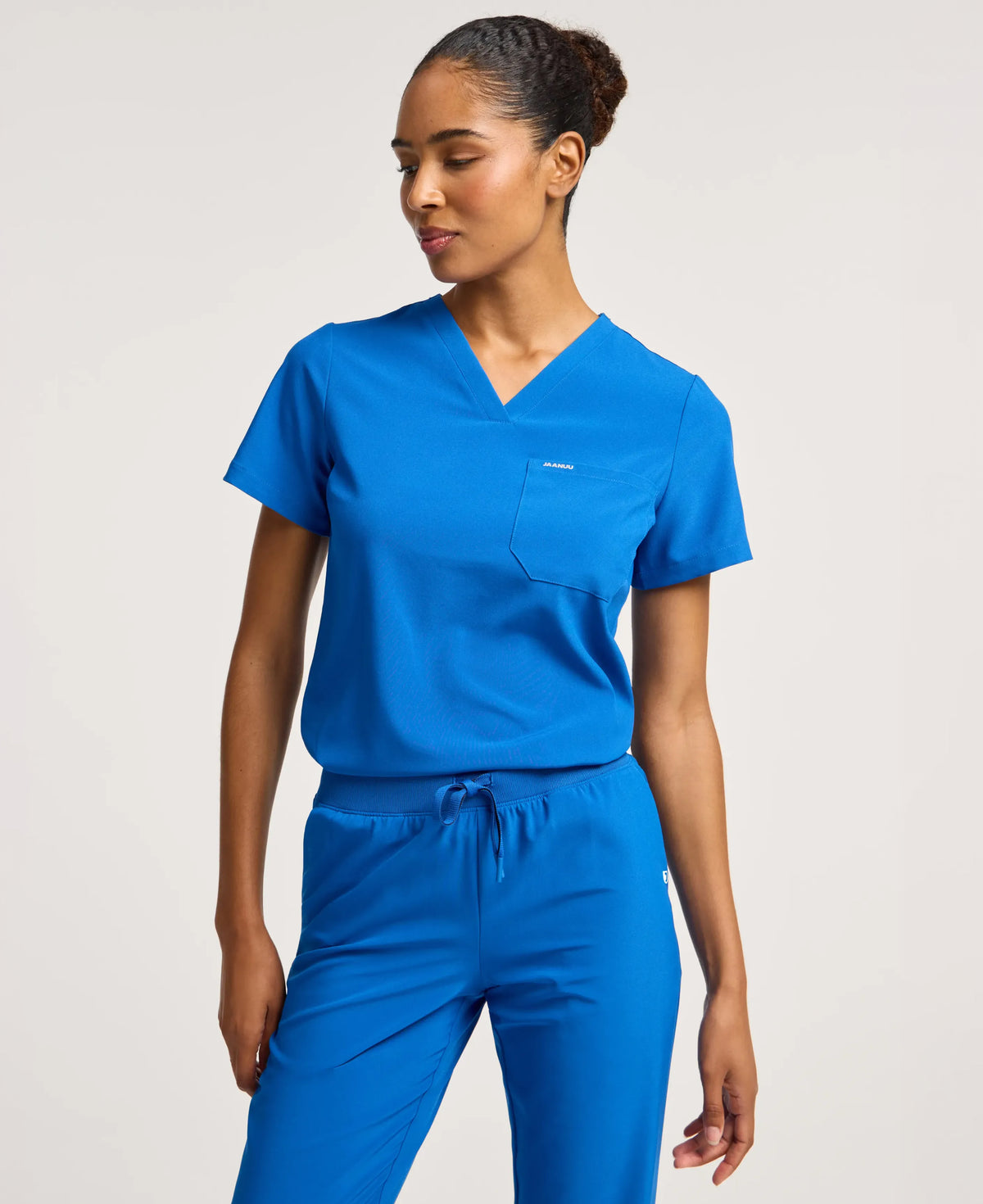 Jaanuu Harlow Slim 1-Pocket Scrub Top in Royal Blue, product photo 3 of 6