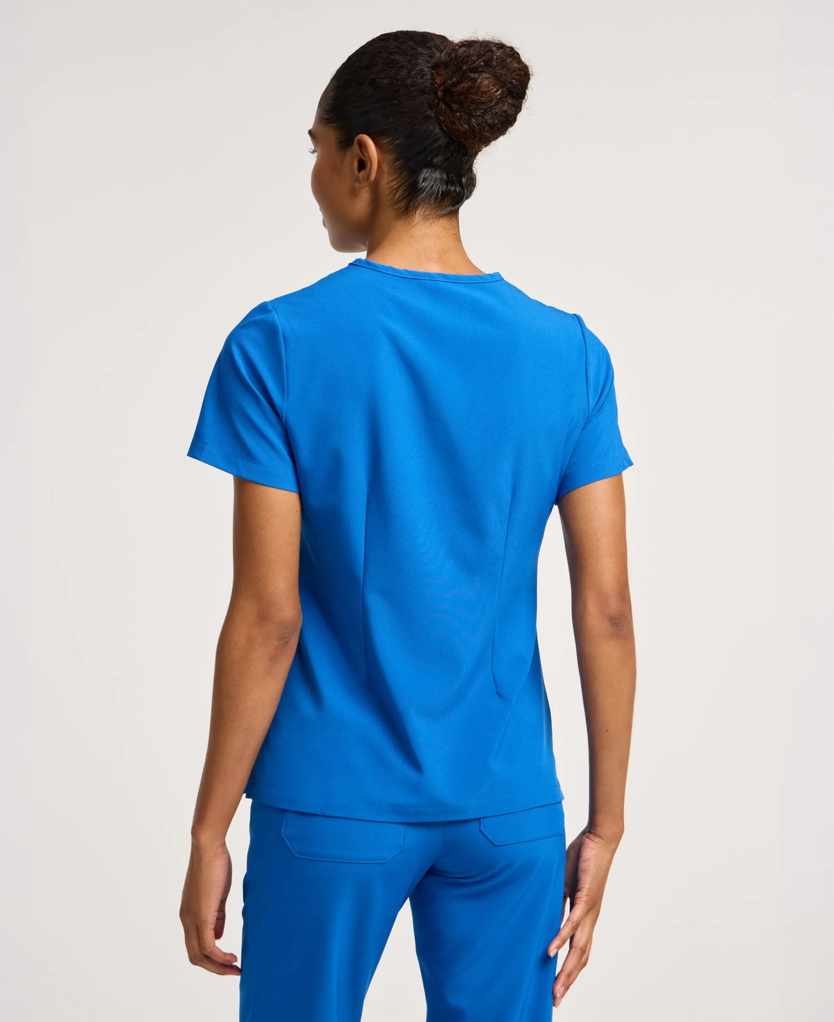 Jaanuu Harlow Slim 1-Pocket Scrub Top in Royal Blue, product photo 6 of 6