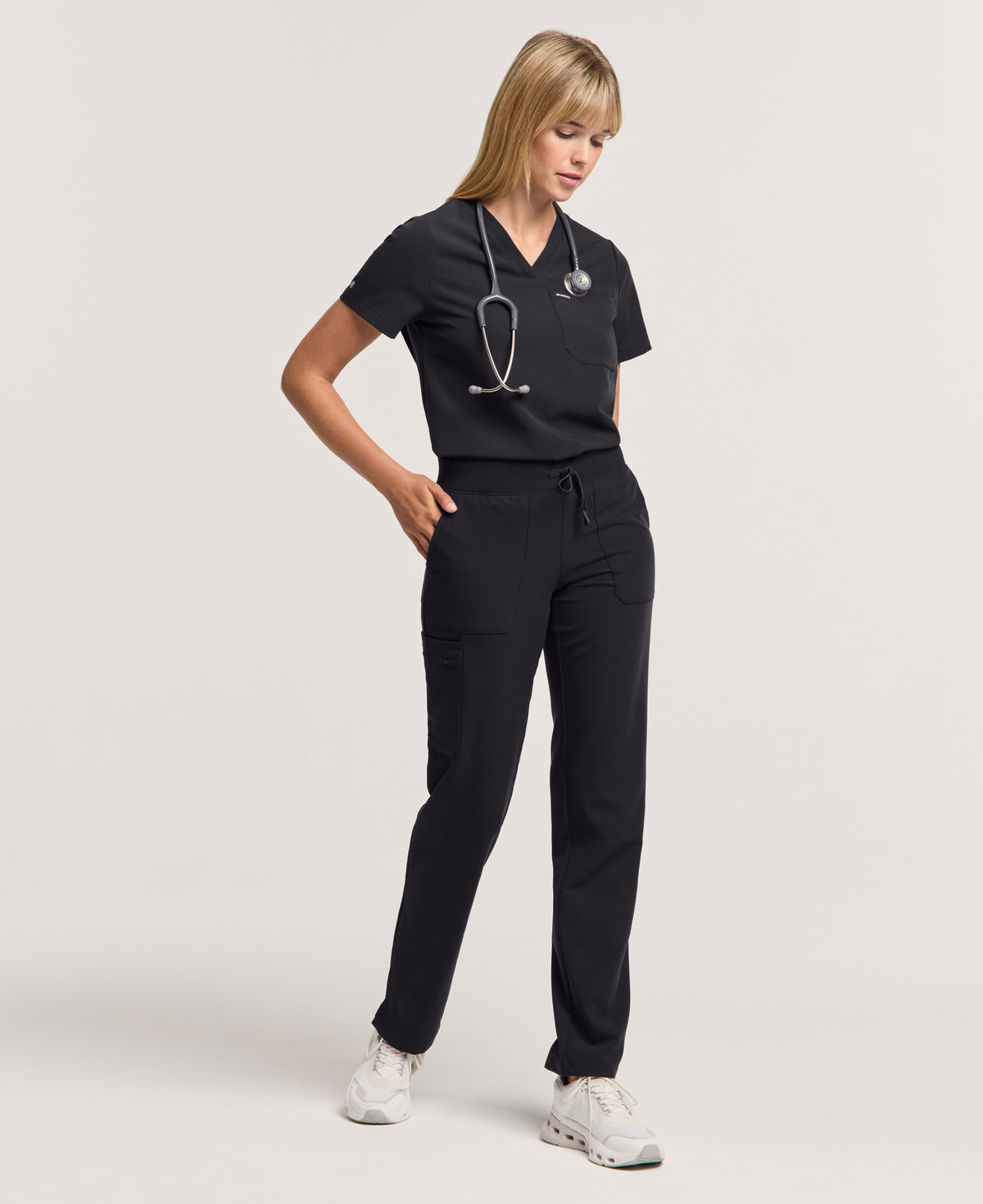 Jaanuu Xenos Cargo Scrub Pant in Black, product photo 2 of 6
