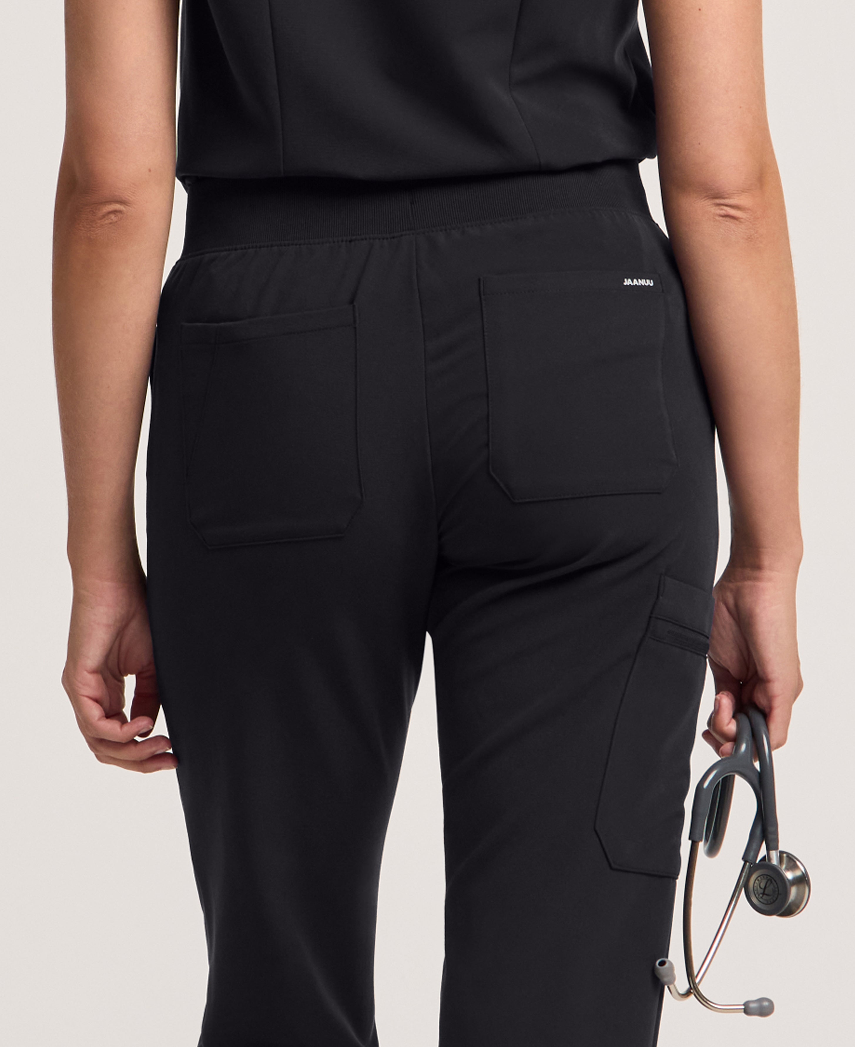 Jaanuu Xenos Cargo Scrub Pant in Black, product photo 3 of 6