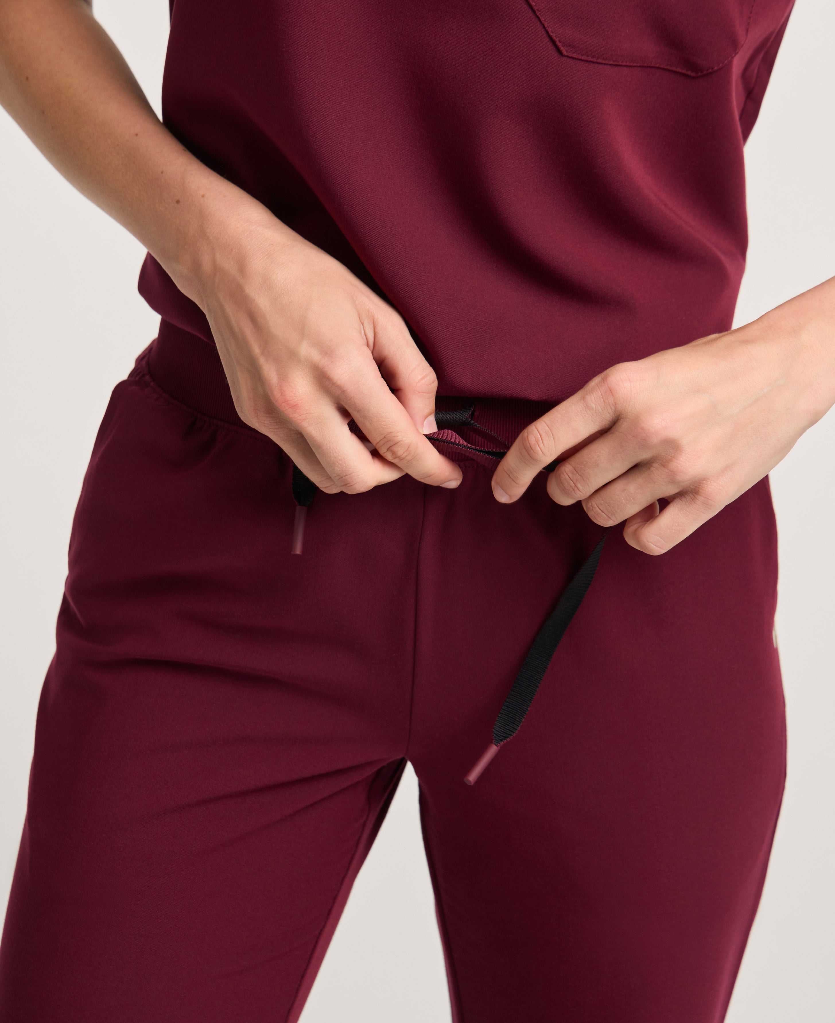 Jaanuu Xenos Knit-Waist Scrub Pant in Burgundy, product photo 4 of 6
