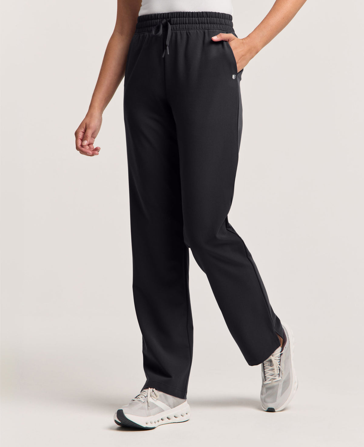 Jaanuu Kerr High Waisted Scrub Pant in Black, product photo 1 of 6