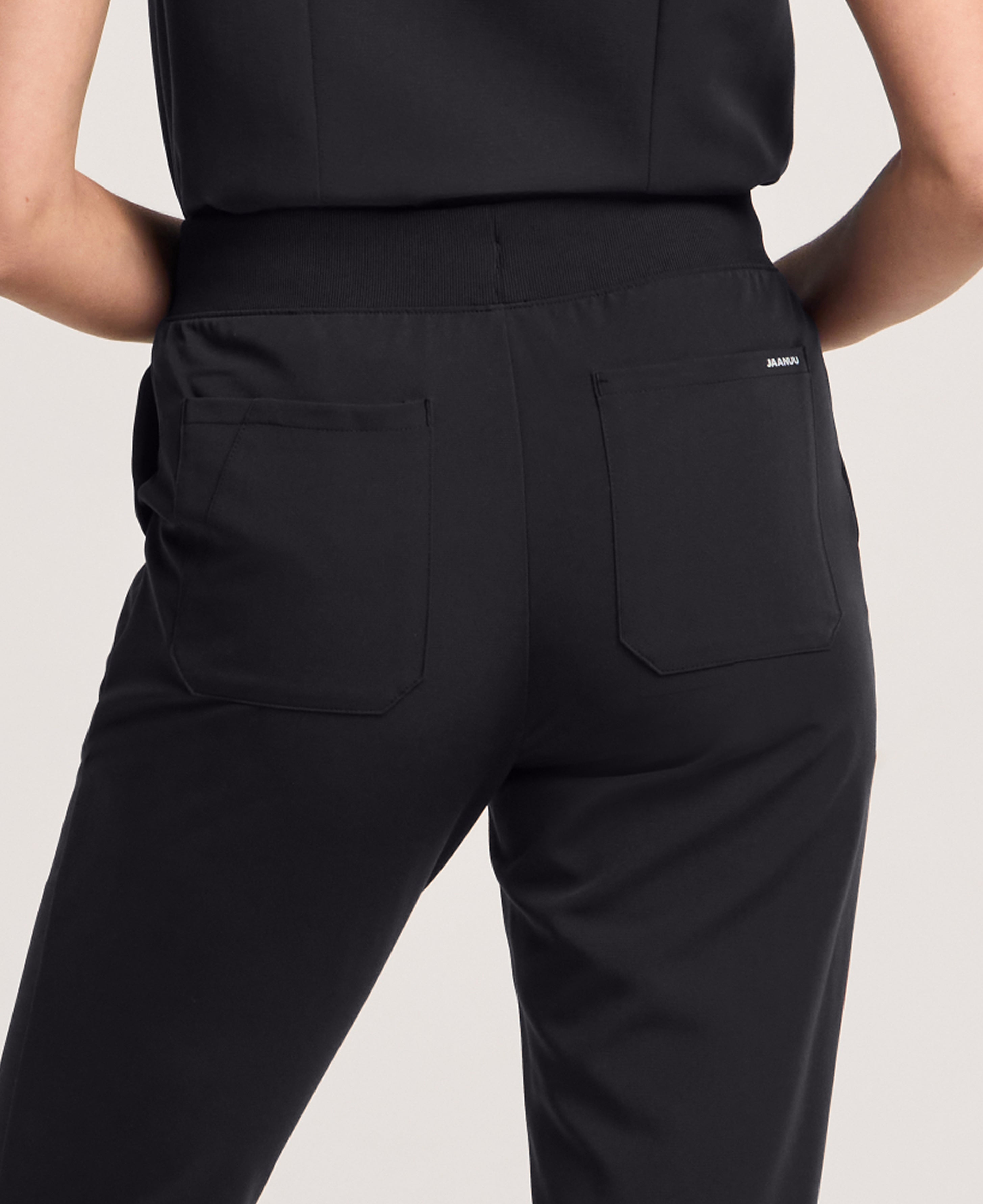 Jaanuu Xenos Slim Knit-Waist Scrub Pant in Black, product photo 3 of 6