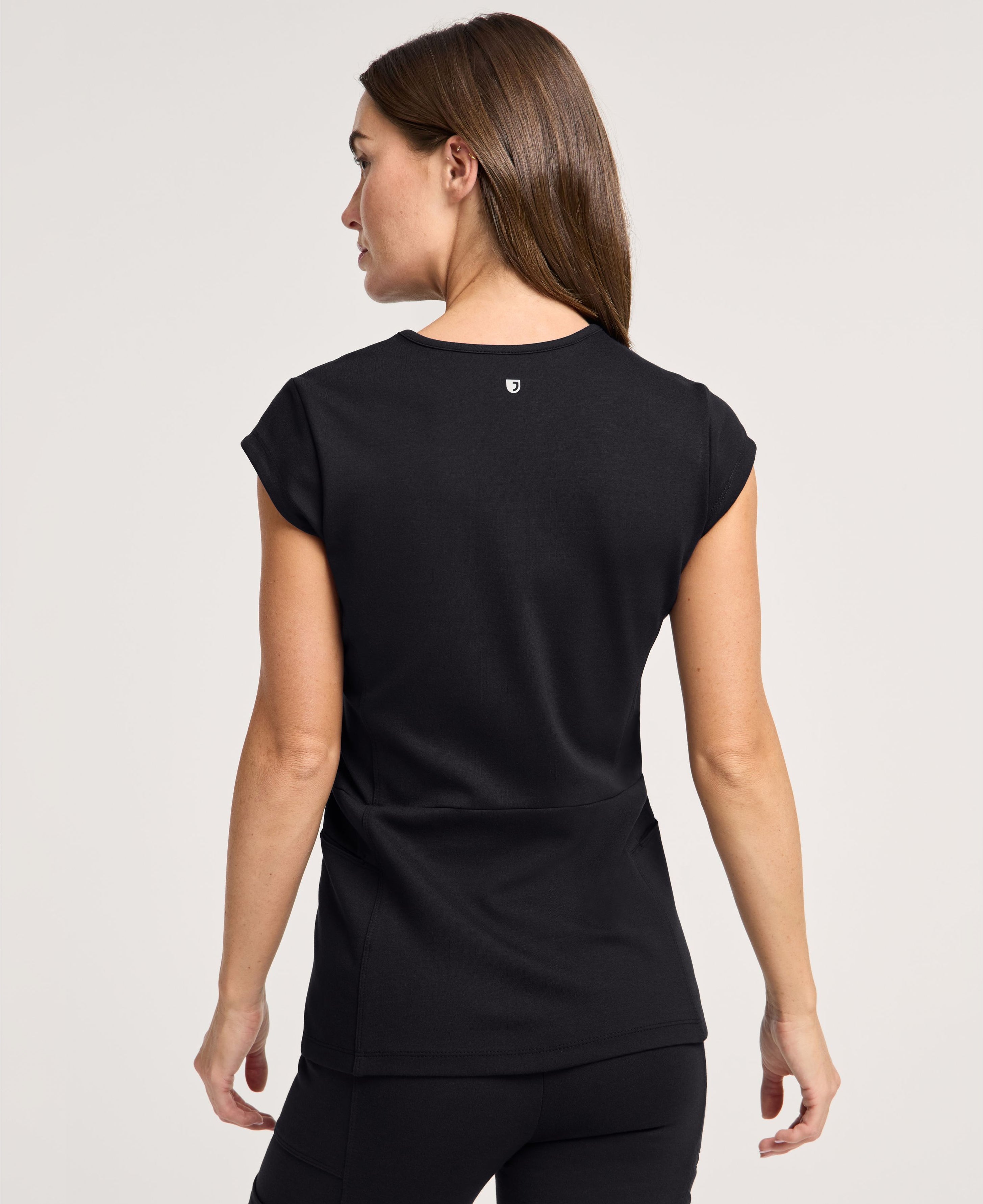 Jaanuu Isla Mock-Wrap Scrub Top in Black, product photo 5 of 6