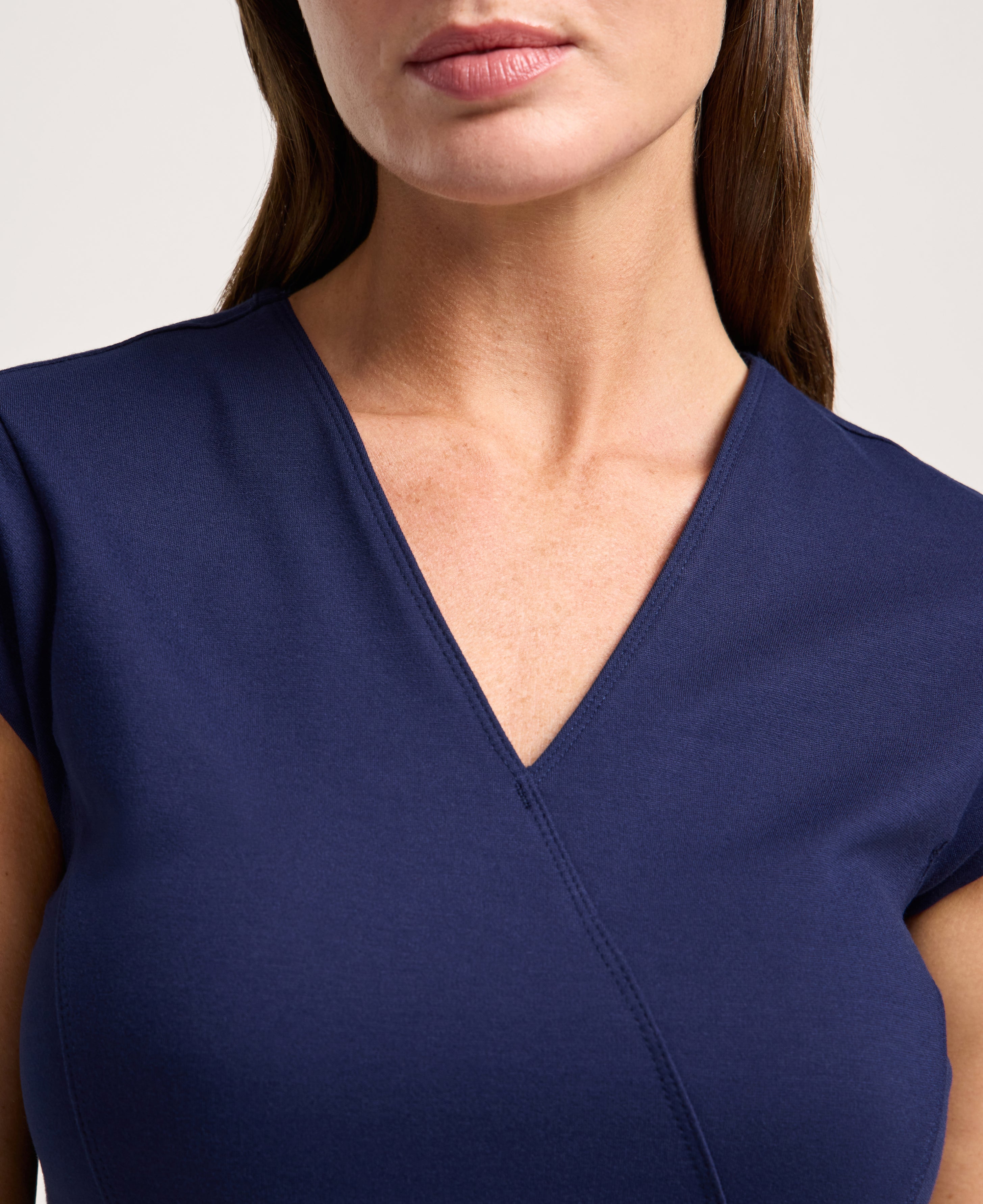 Jaanuu Isla Mock-Wrap Scrub Top in Midnight Navy, product photo 3 of 6
