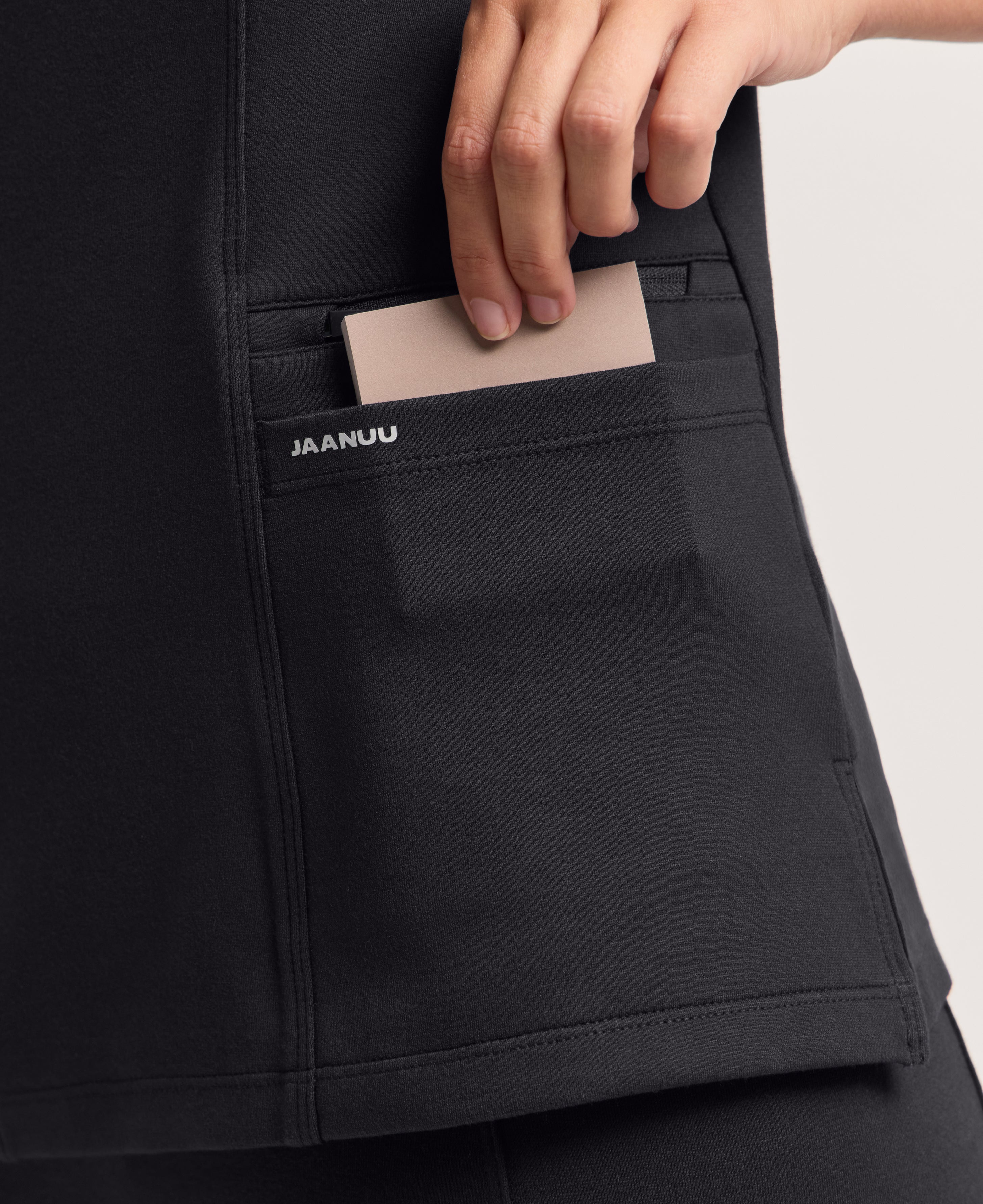Jaanuu Zoe Slim 3/4-Sleeve Scrub Top in Black, product photo 3 of 6