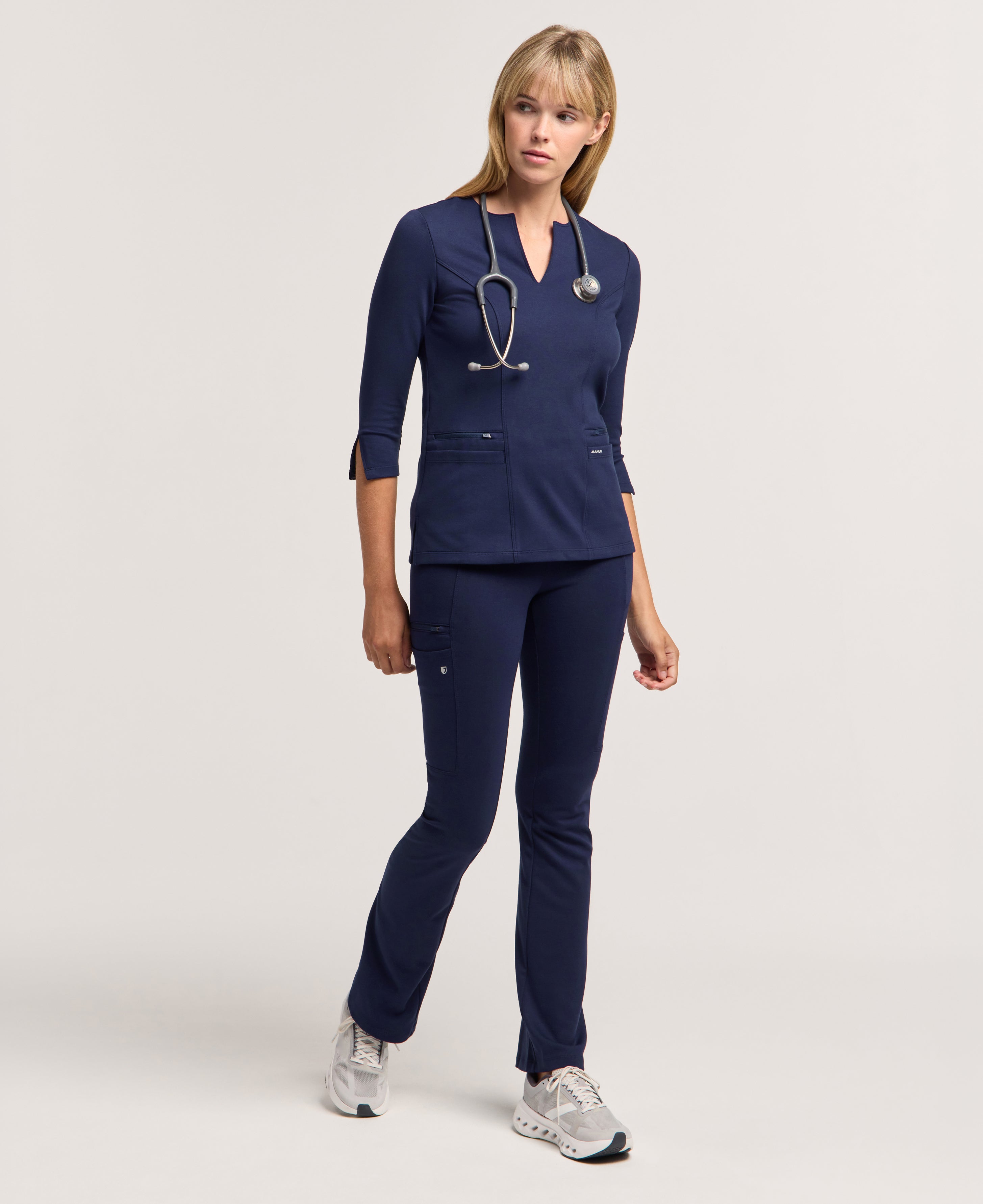 Jaanuu Zoe Slim 3/4-Sleeve Scrub Top in Midnight Navy, product photo 1 of 6