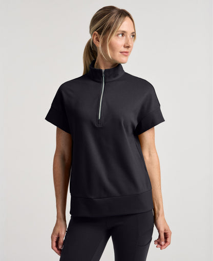 Jaanuu Noam Boxy Scrub Top in Black, product photo 1 of 6