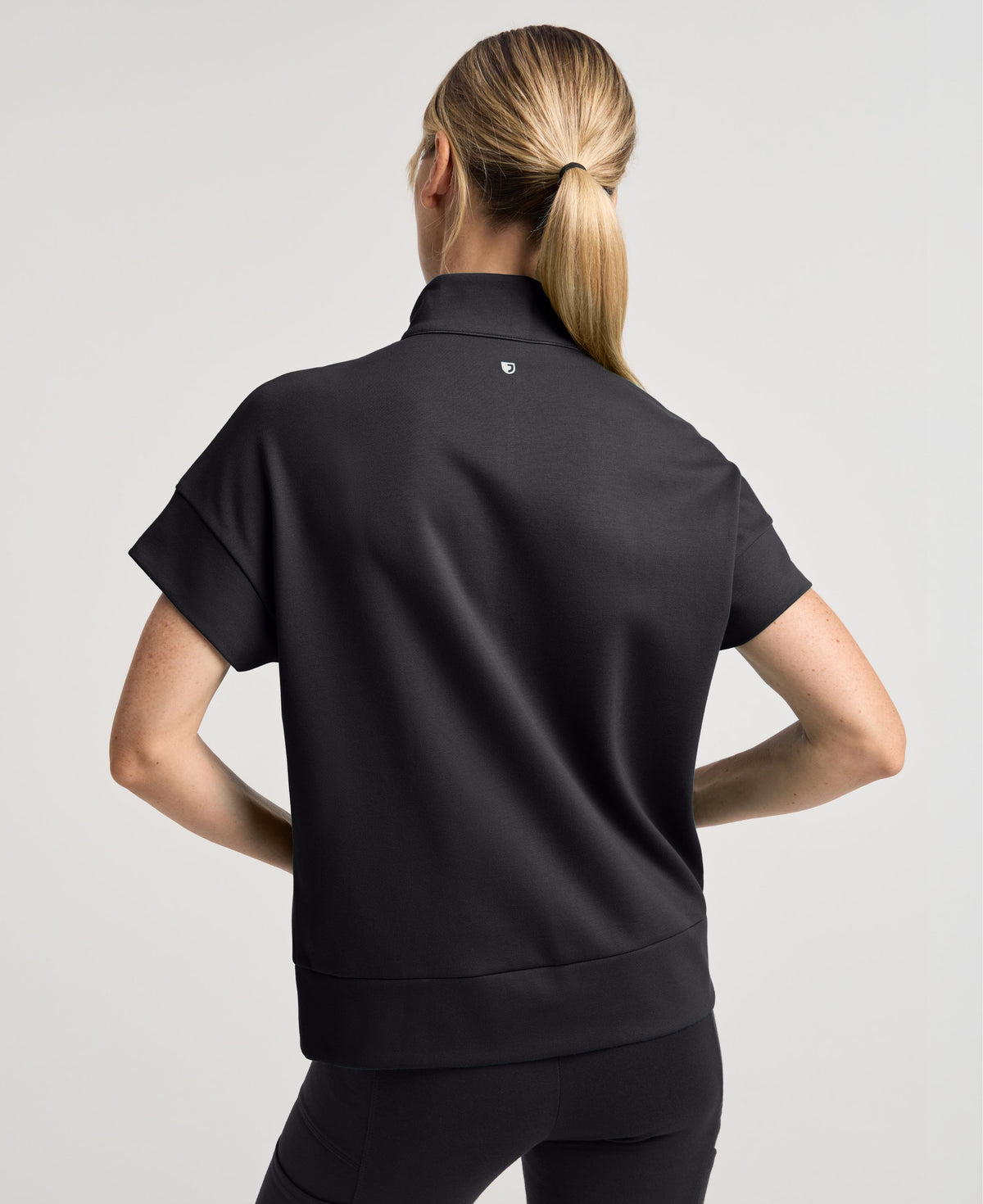 Jaanuu Noam Boxy Scrub Top in Black, product photo 5 of 6