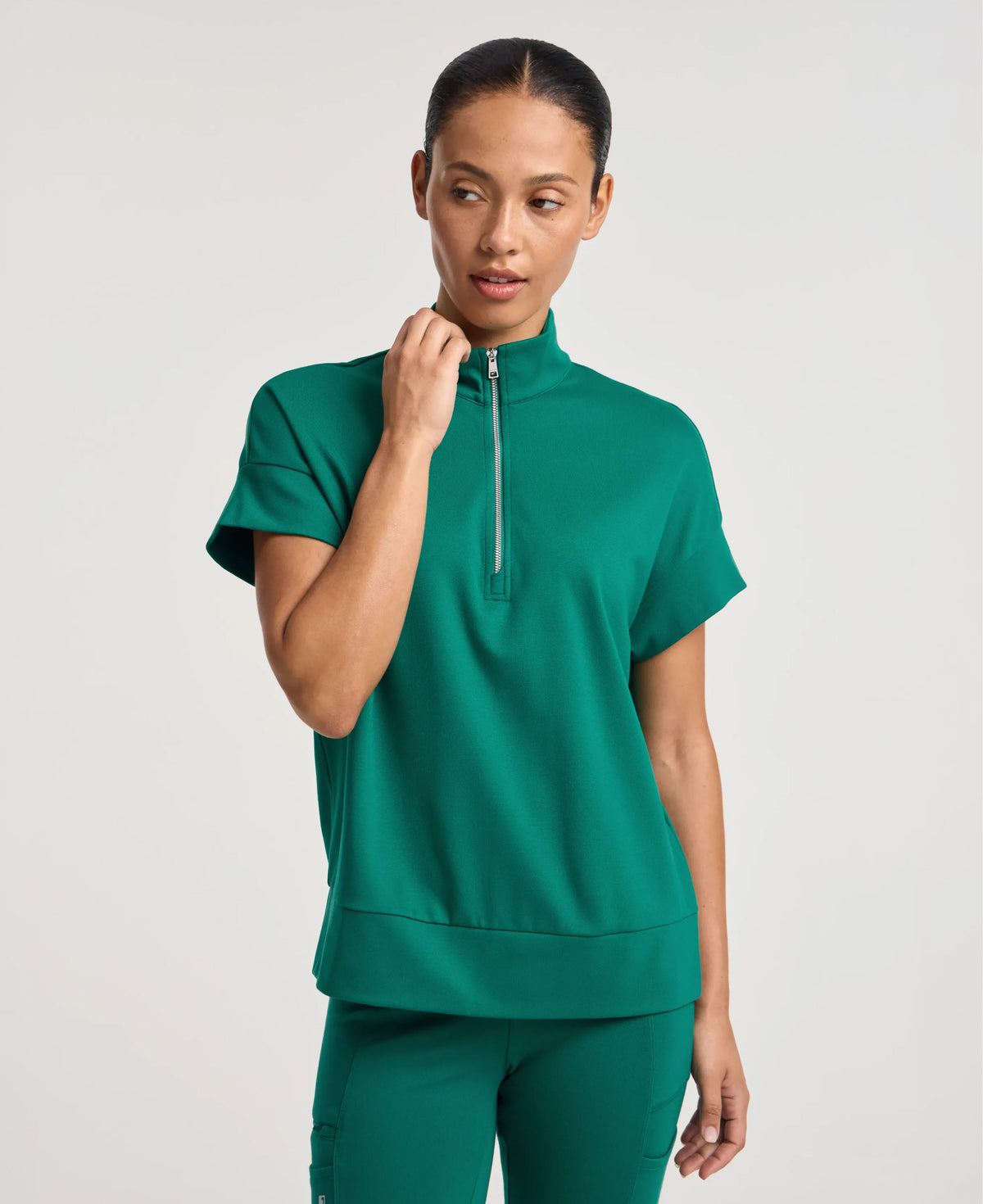 Jaanuu Noam Boxy Scrub Top in Hunter Green, product photo 1 of 6