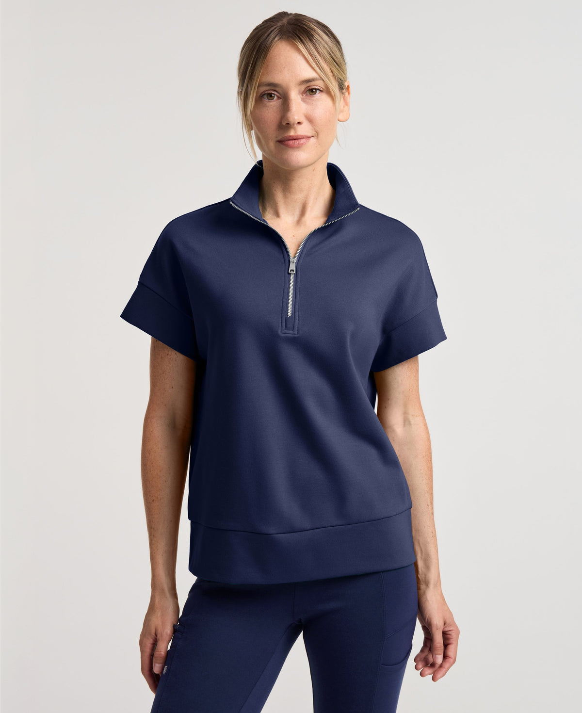 Jaanuu Noam Boxy Scrub Top in Midnight Navy, product photo 1 of 6