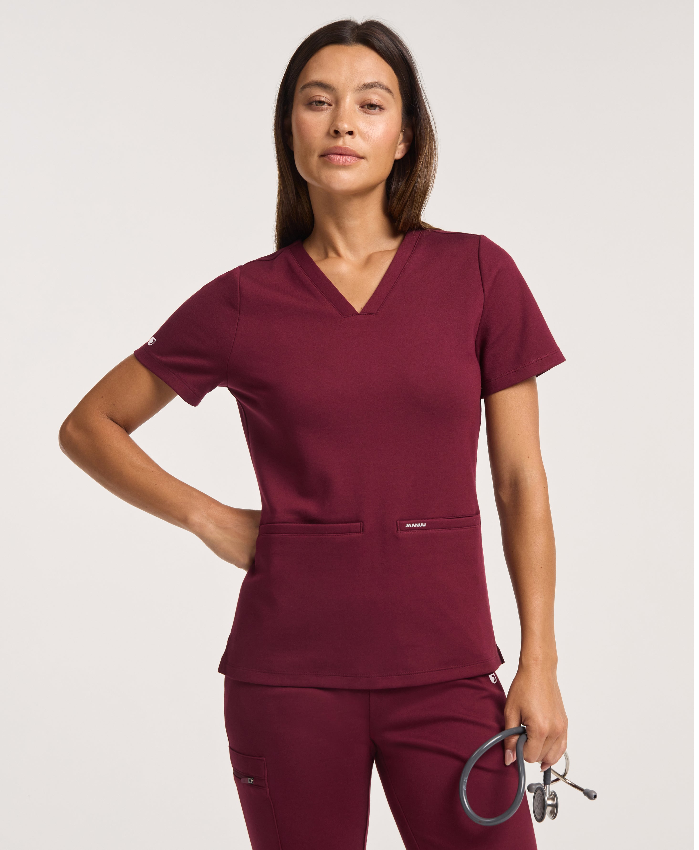 Jaanuu Cesi Slim Scrub Top in Burgundy, product photo 1 of 6