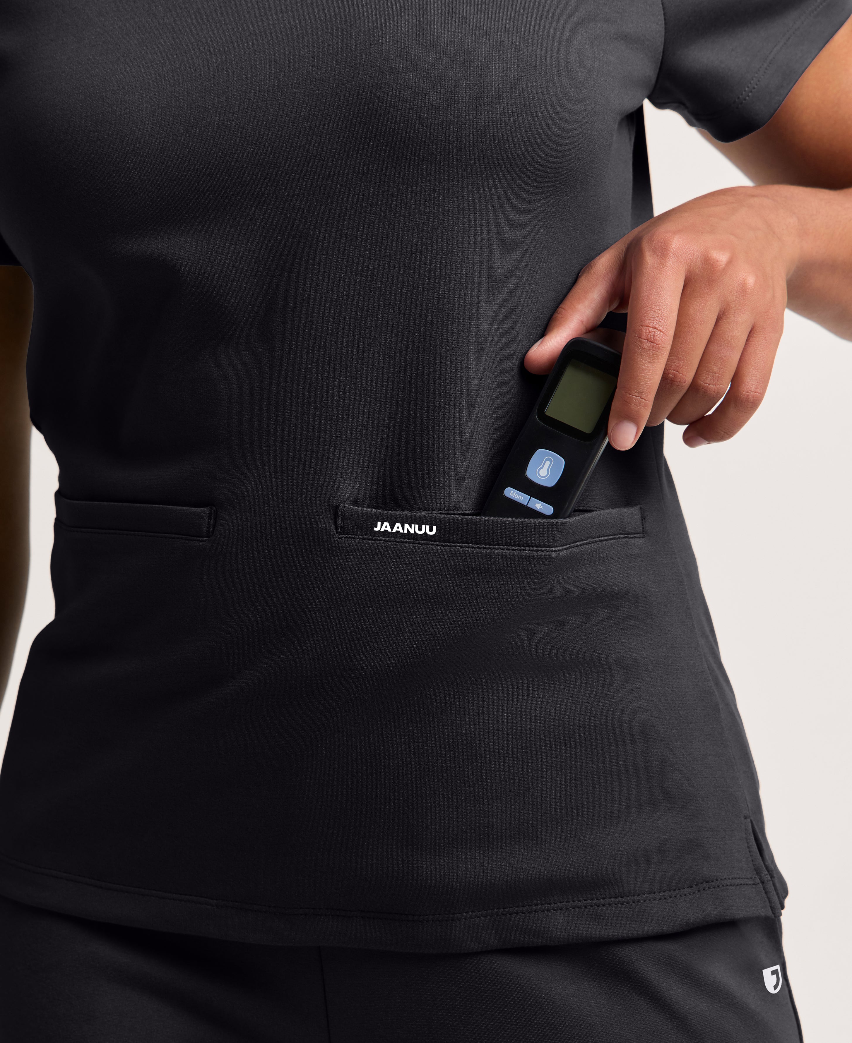 Jaanuu Cesi Slim Scrub Top in Black, product photo 3 of 6