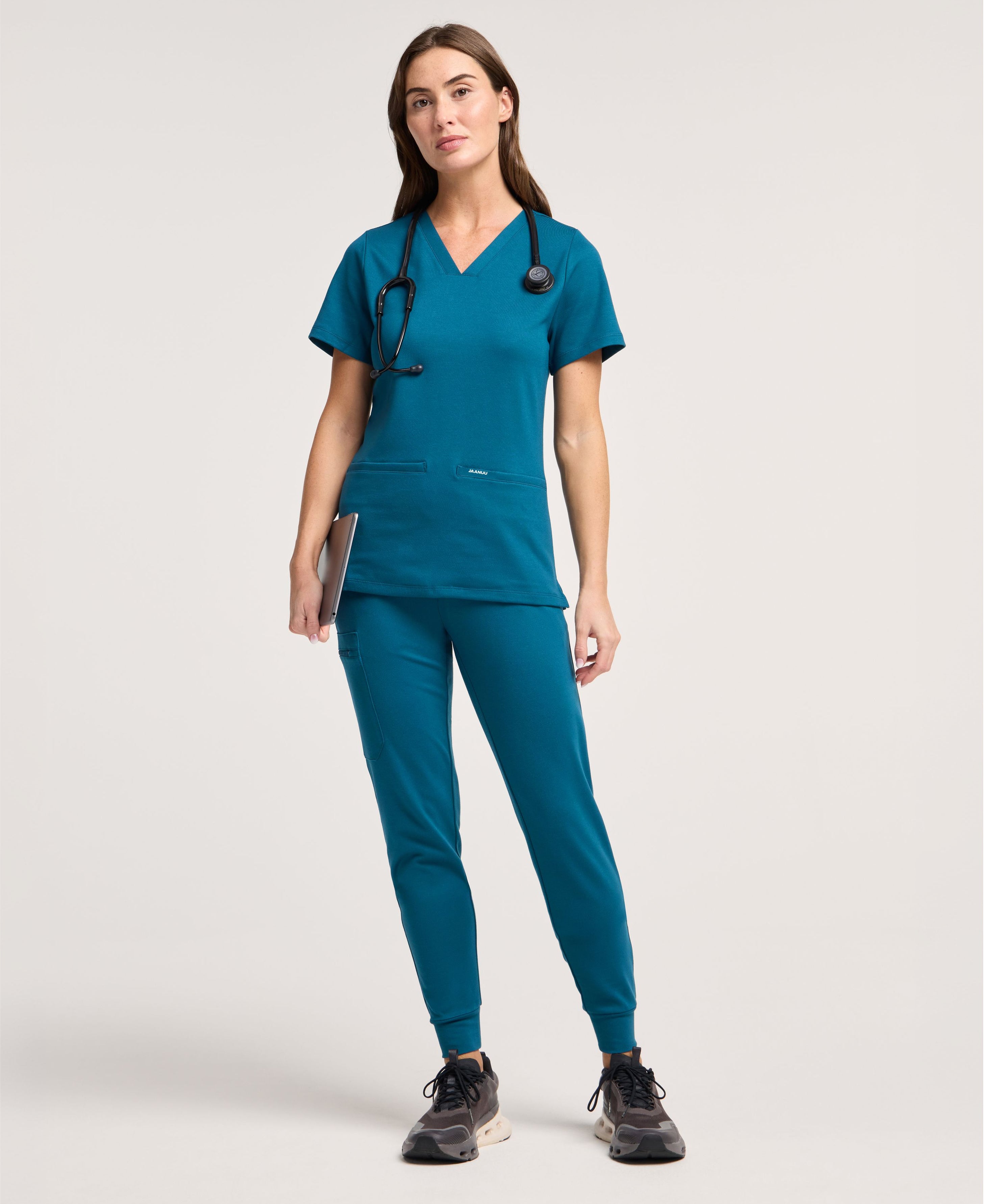 Jaanuu Cesi Slim Scrub Top in Caribbean Blue, product photo 1 of 6