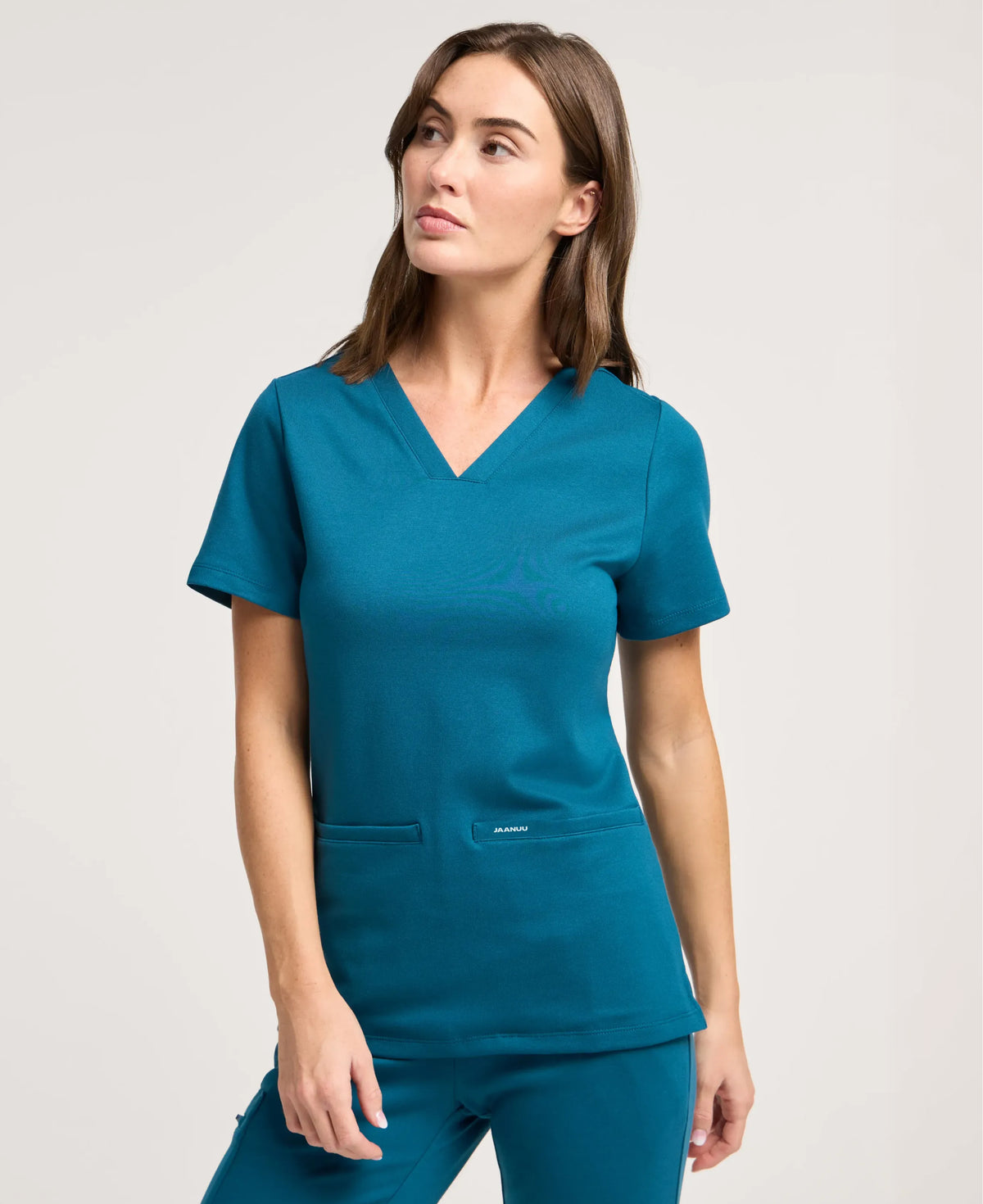 Jaanuu Cesi Slim Scrub Top in Caribbean Blue, product photo 2 of 6