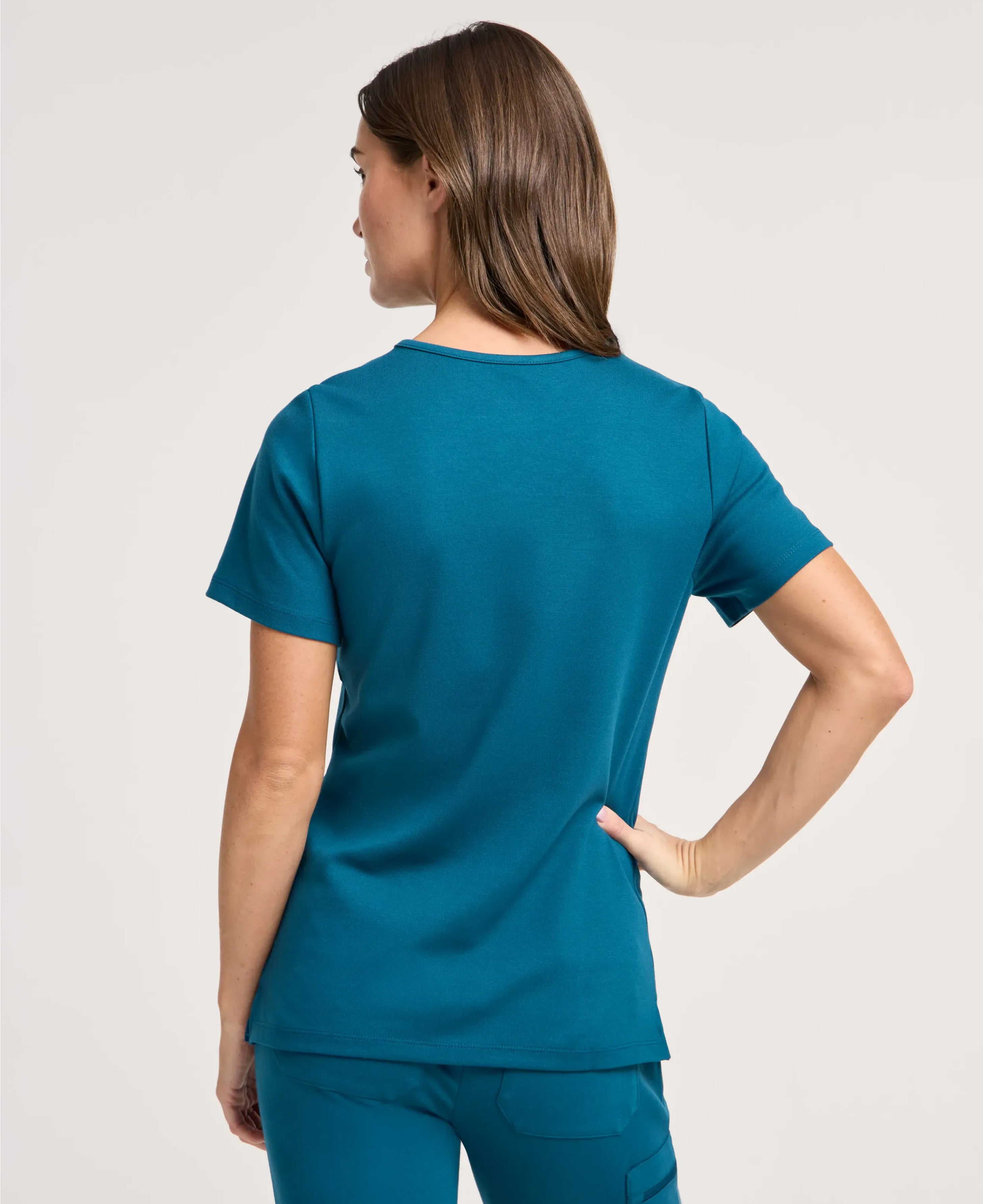 Jaanuu Cesi Slim Scrub Top in Caribbean Blue, product photo 4 of 6