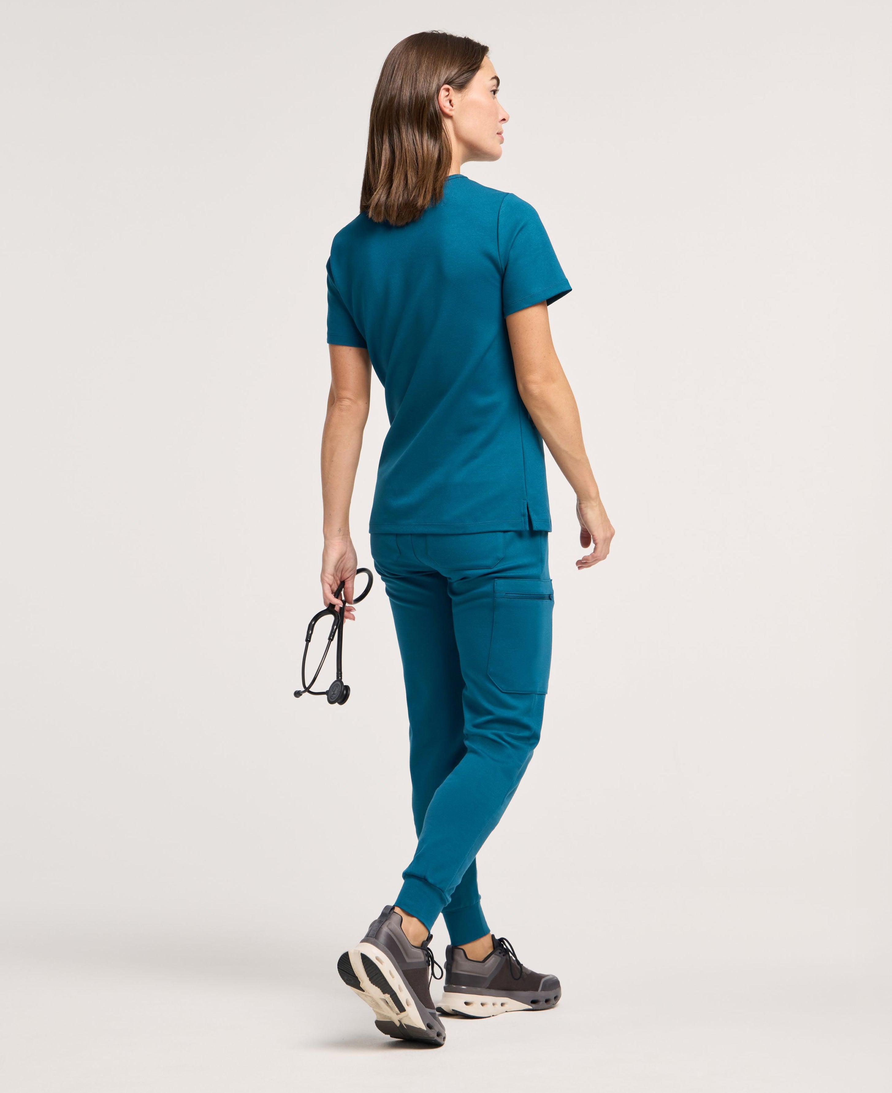 Jaanuu Cesi Slim Scrub Top in Caribbean Blue, product photo 5 of 6