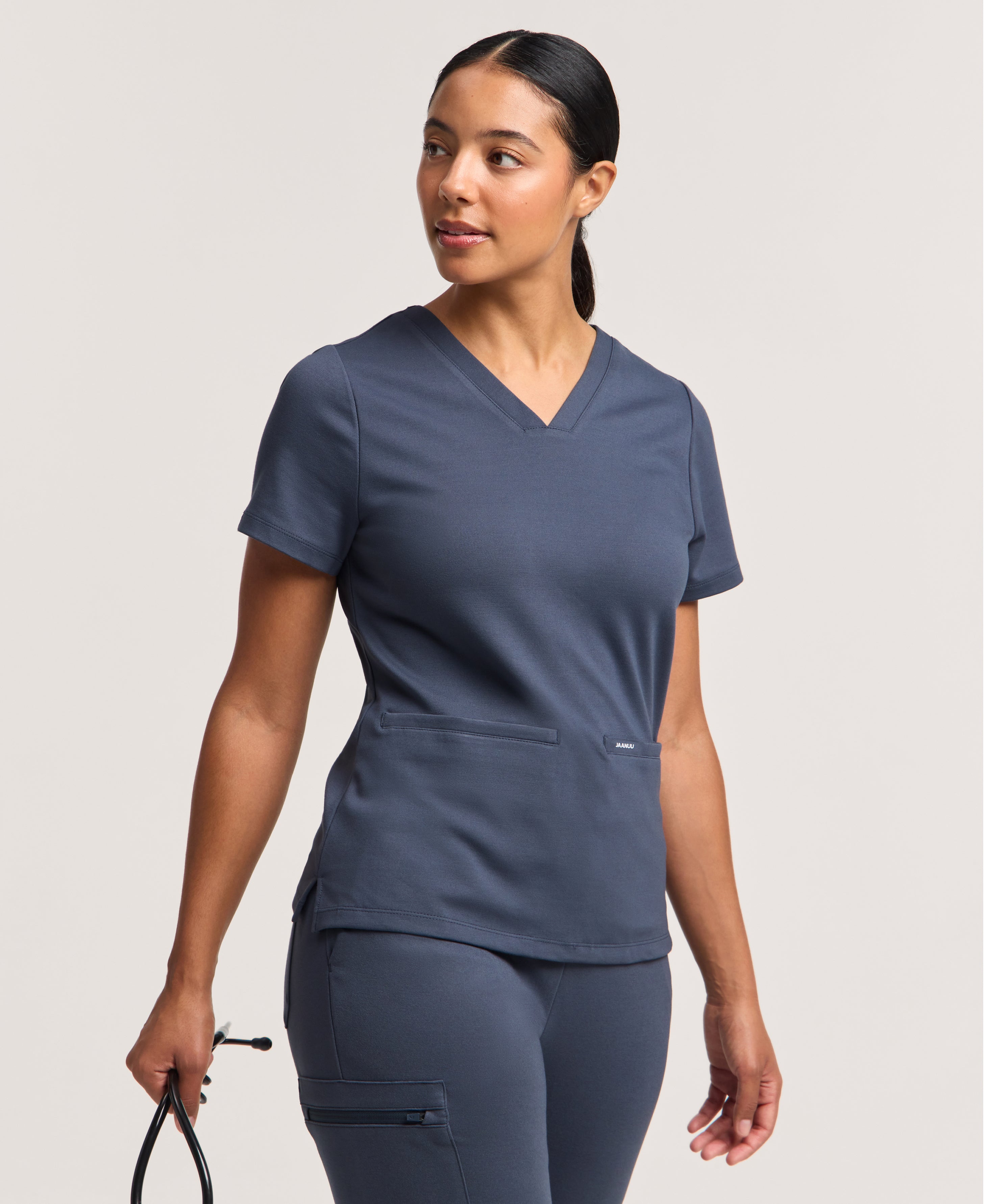 Jaanuu Cesi Slim Scrub Top in Carbon Gray, product photo 1 of 6