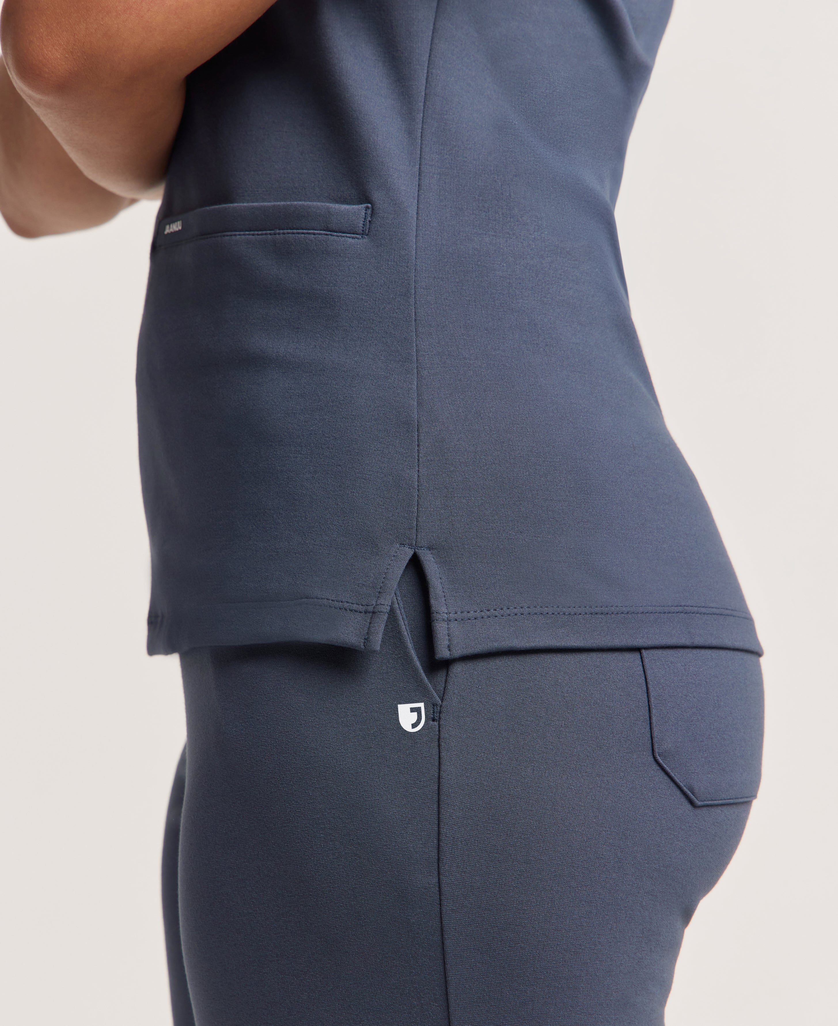 Jaanuu Cesi Slim Scrub Top in Carbon Gray, product photo 4 of 6