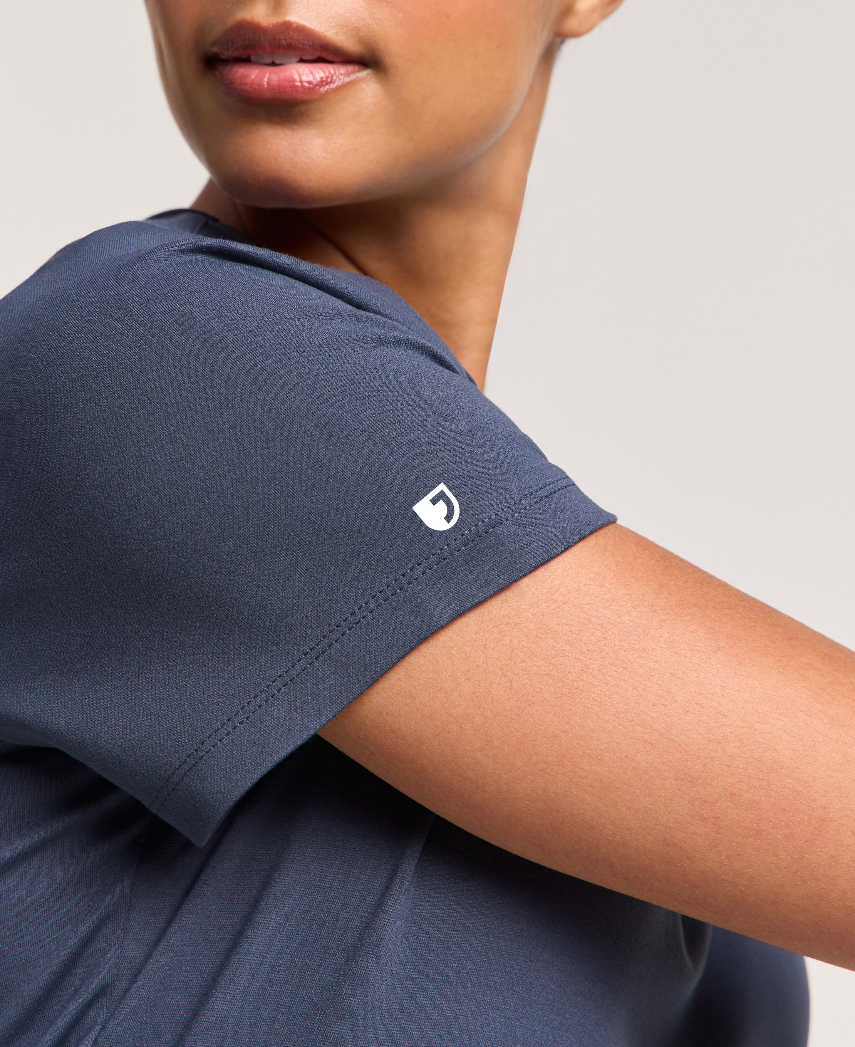 Jaanuu Cesi Slim Scrub Top in Carbon Gray, product photo 5 of 6