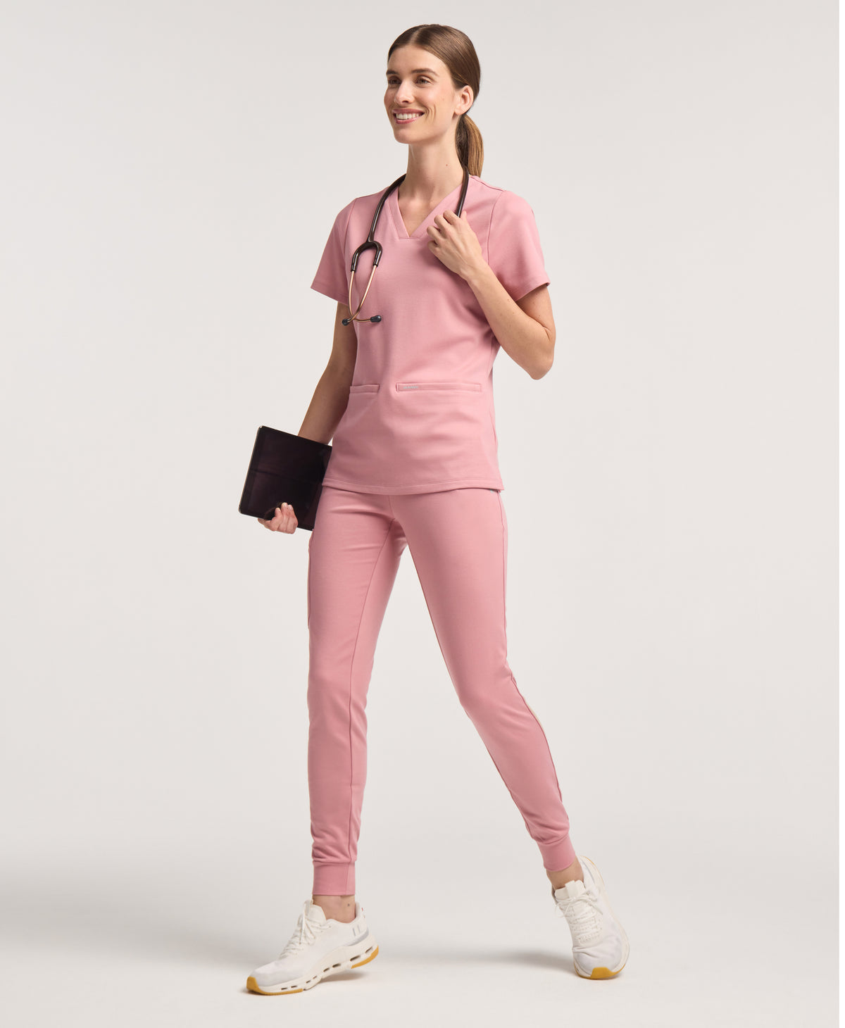 Jaanuu Cesi Slim Scrub Top in Mauve, product photo 1 of 6