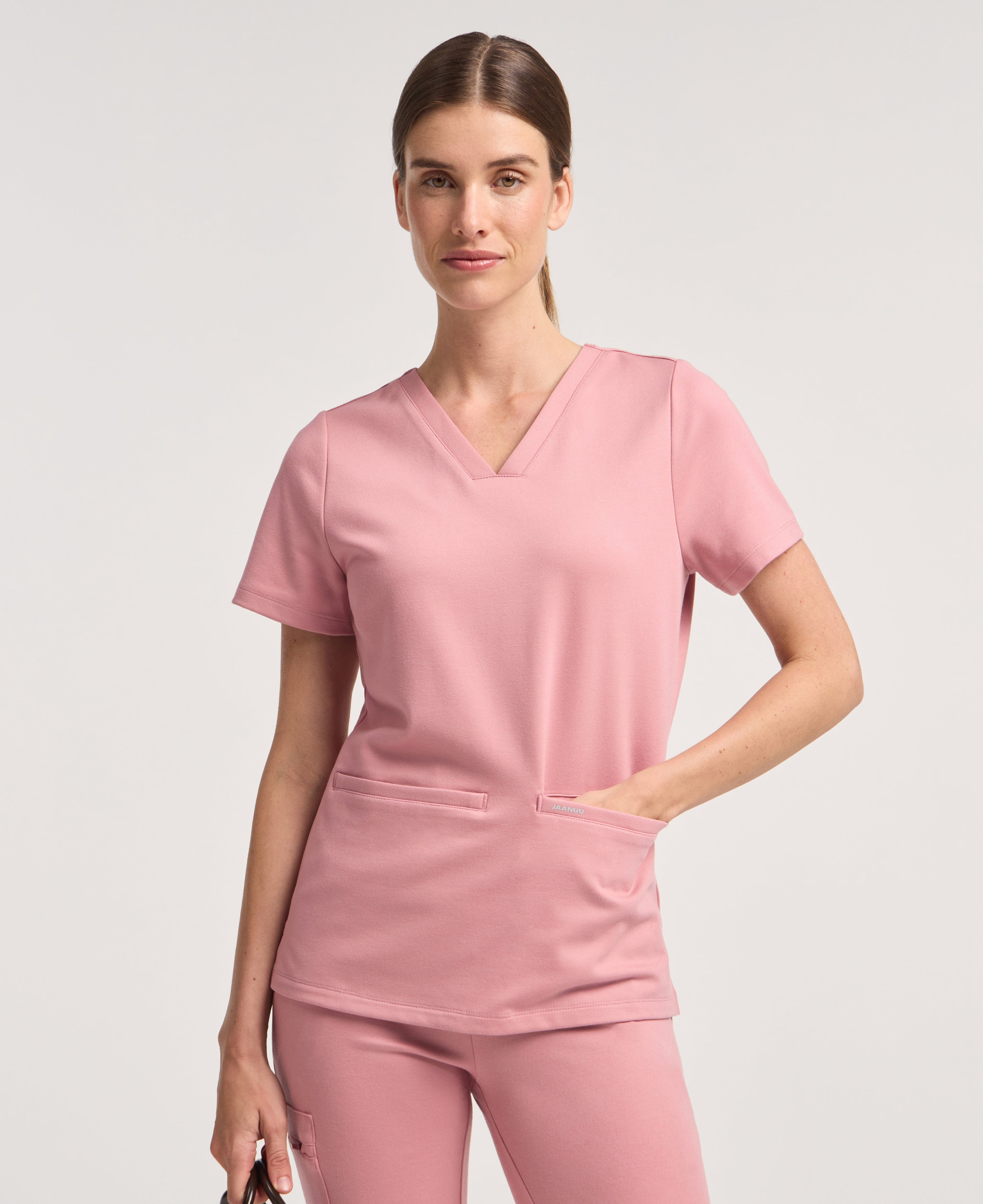 Jaanuu Cesi Slim Scrub Top in Mauve, product photo 2 of 6