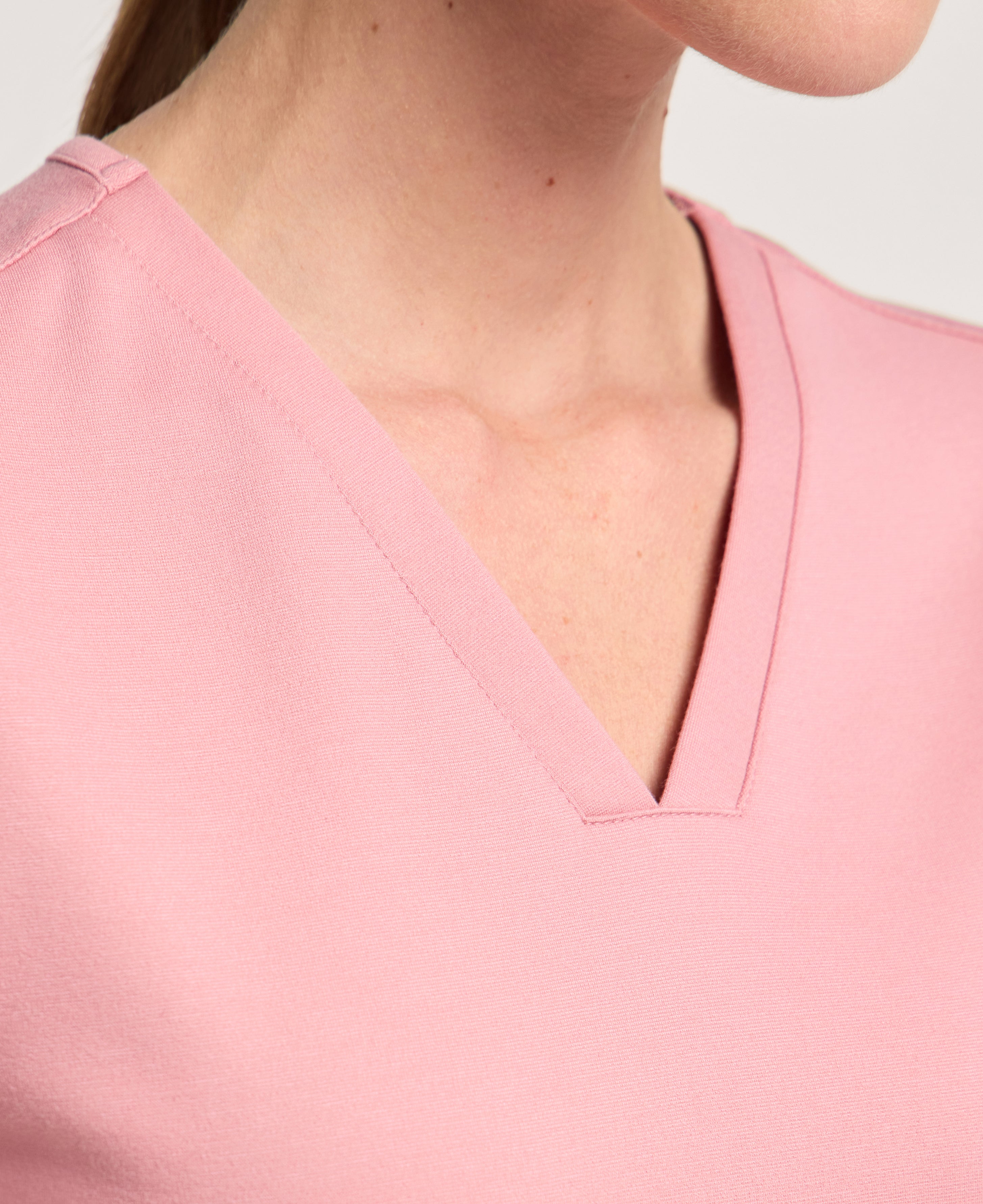 Jaanuu Cesi Slim Scrub Top in Mauve, product photo 5 of 6