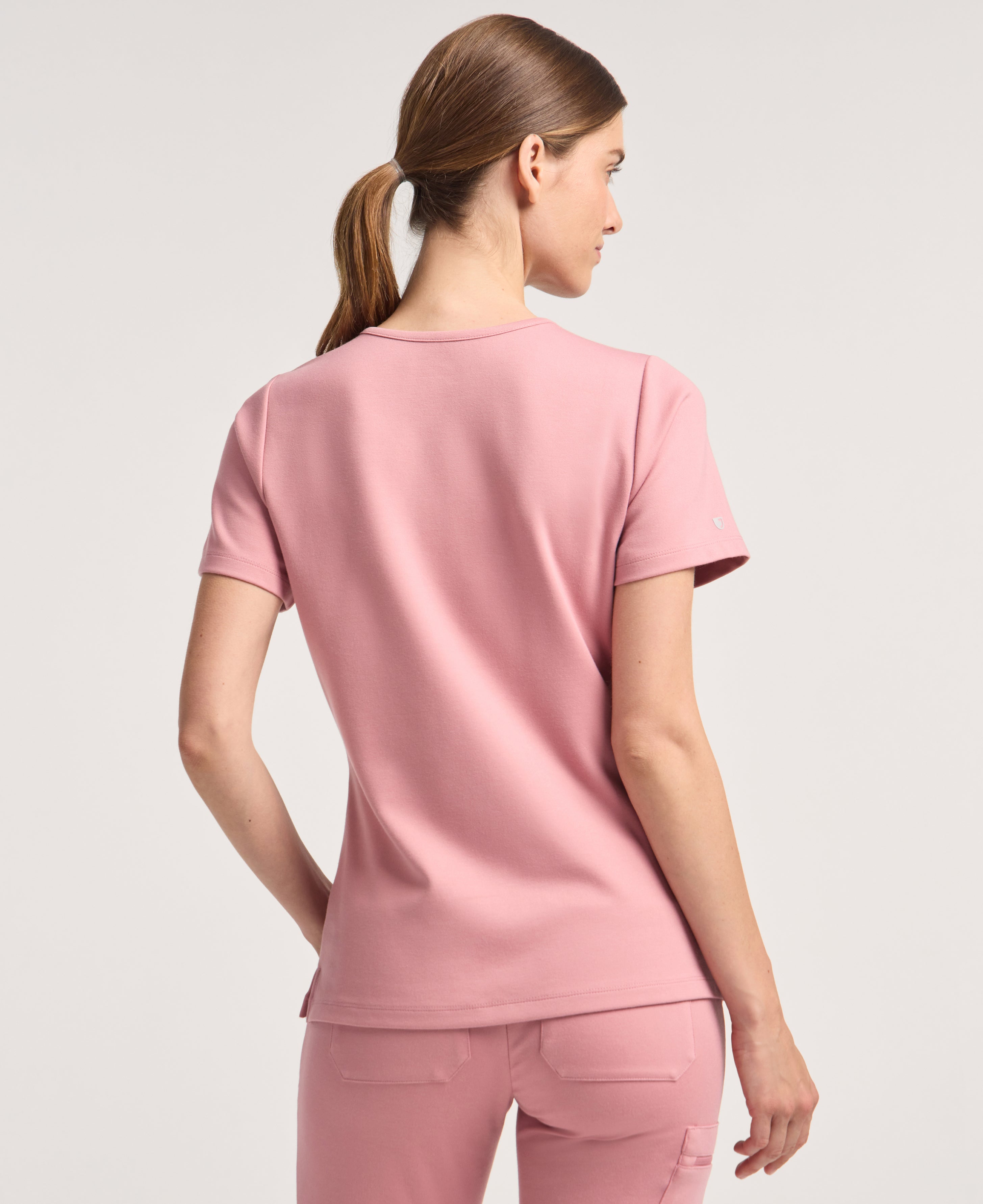 Jaanuu Cesi Slim Scrub Top in Mauve, product photo 6 of 6