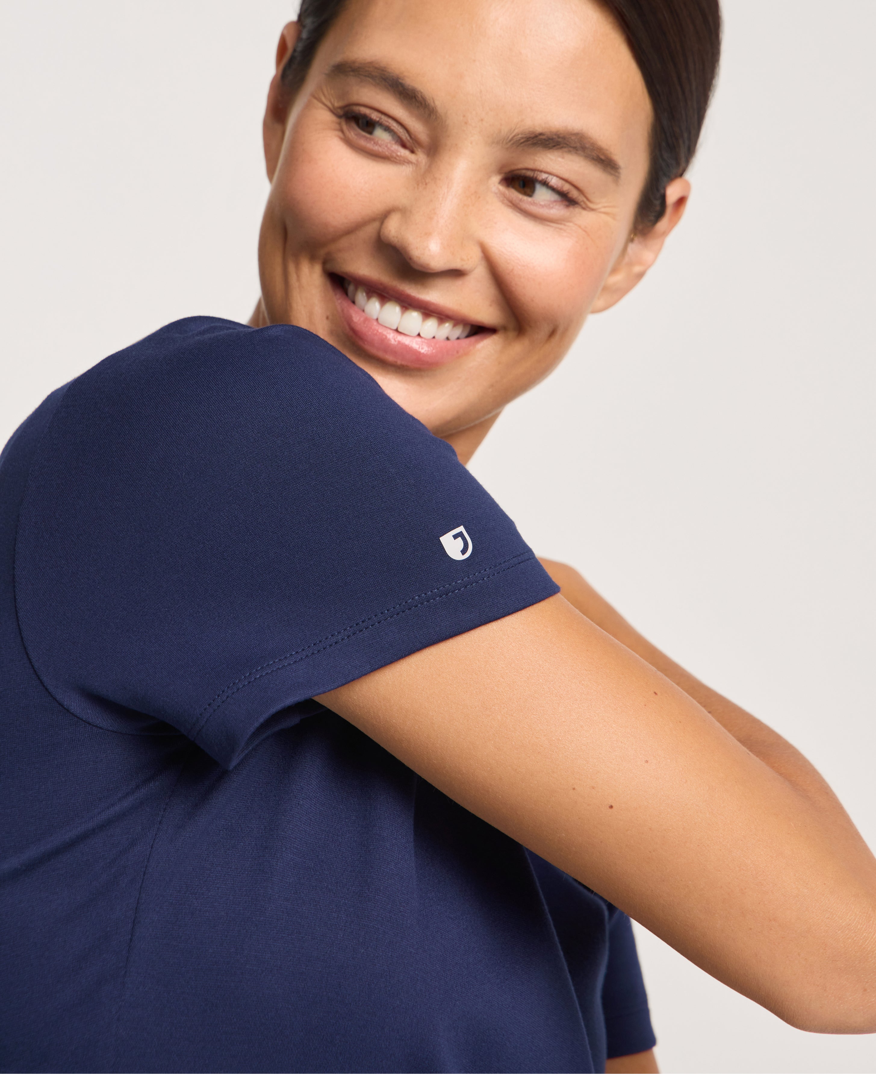 Jaanuu Cesi Slim Scrub Top in Midnight Navy, product photo 3 of 6