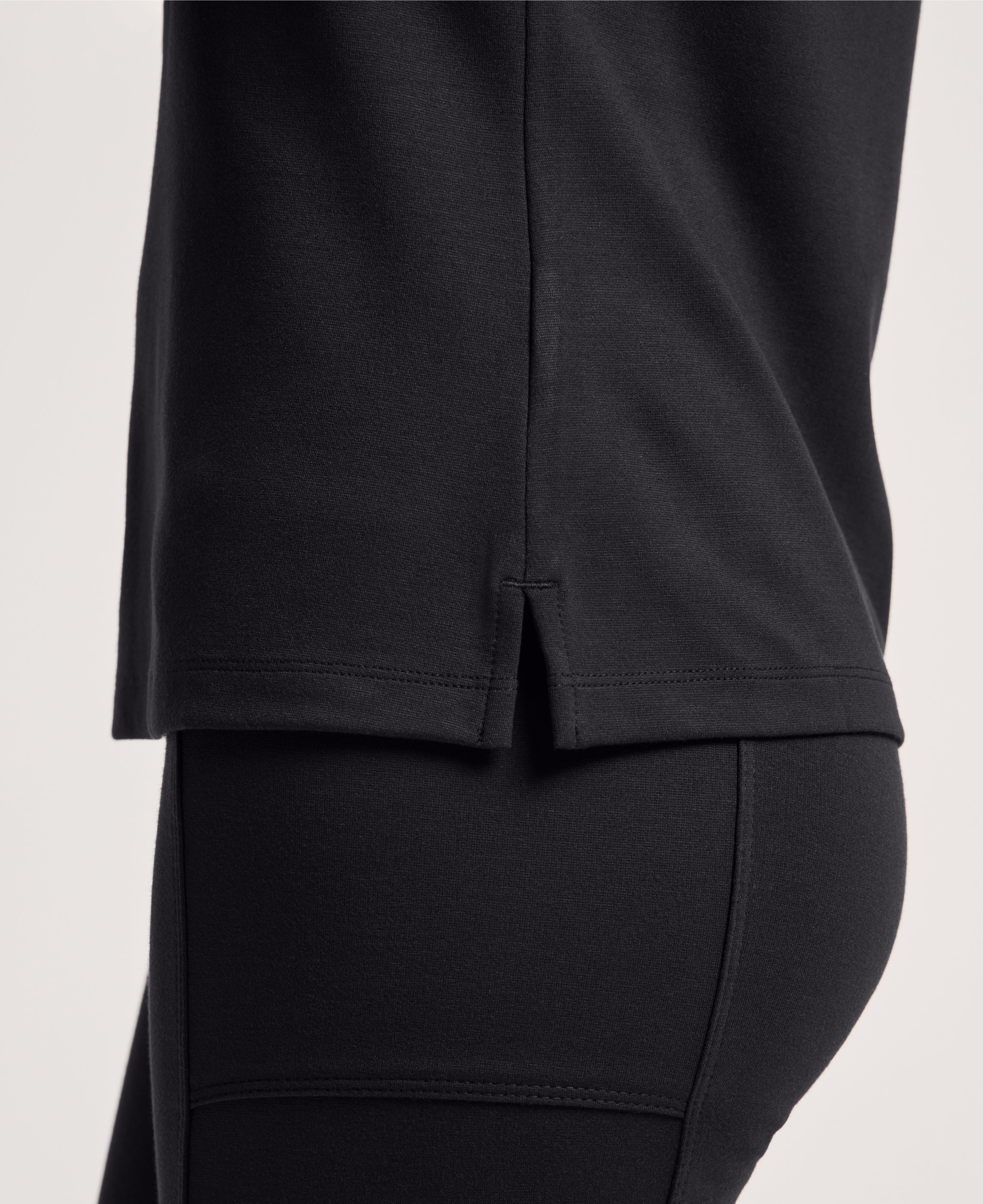 Jaanuu Keva Slim 1-Pocket Scrub Top in Black, product photo 3 of 6