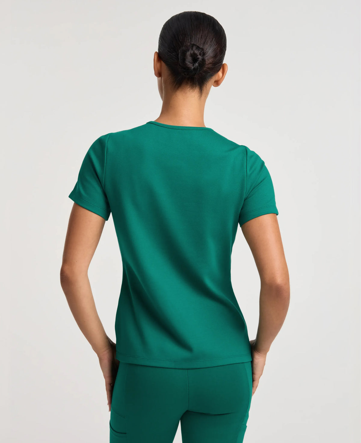 Jaanuu Keva Slim 1-Pocket Scrub Top in Hunter Green, product photo 5 of 6