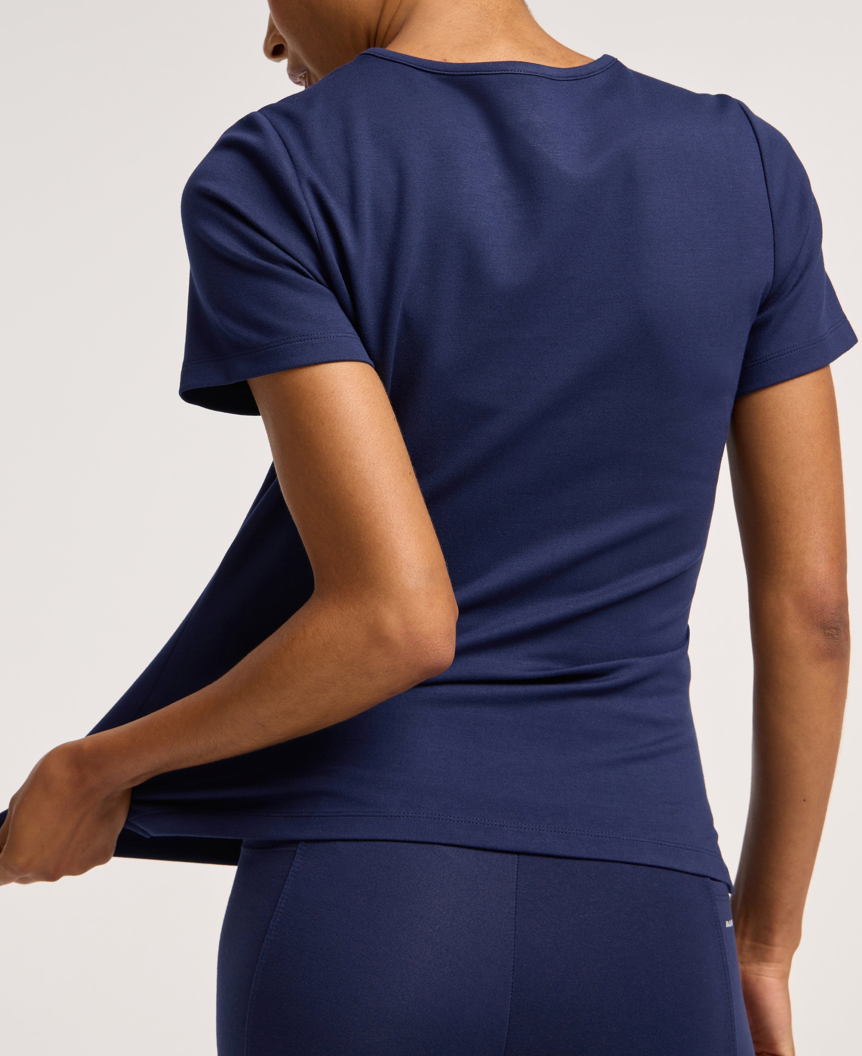 Jaanuu Keva Slim 1-Pocket Scrub Top in Midnight Navy, product photo 6 of 6