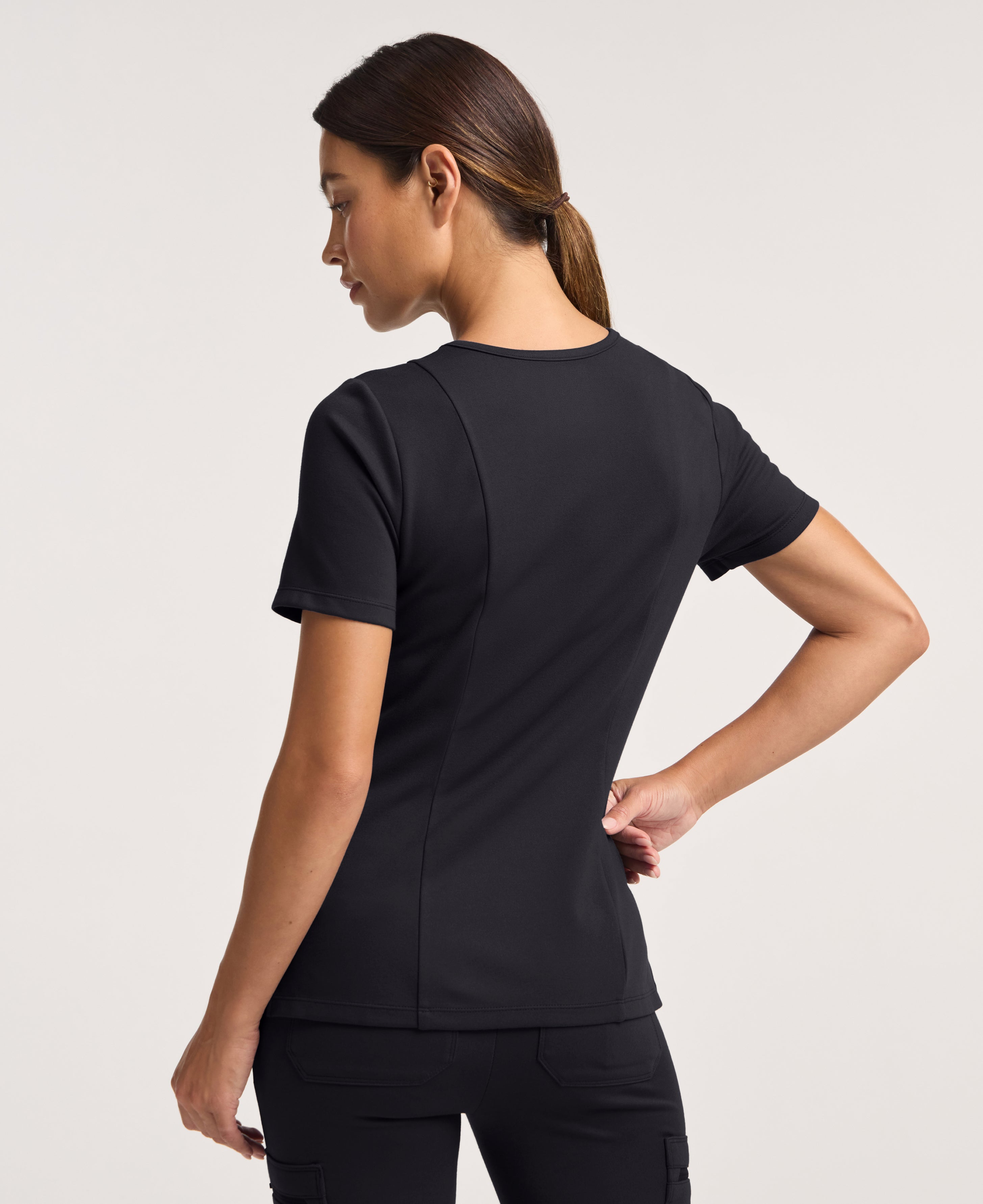 Jaanuu Kass Slim 4-Pocket Scrub Top in Black, product photo 6 of 6