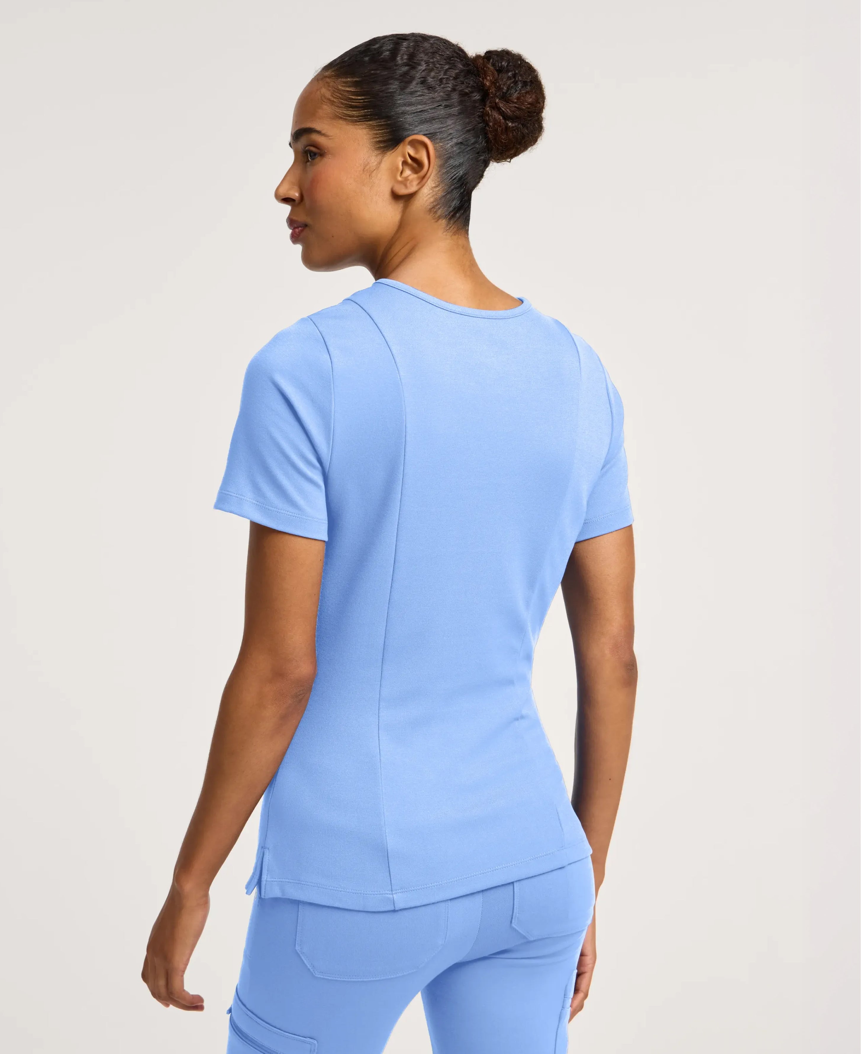 Jaanuu Kass Slim 4-Pocket Scrub Top in Ceil Blue, product photo 6 of 6