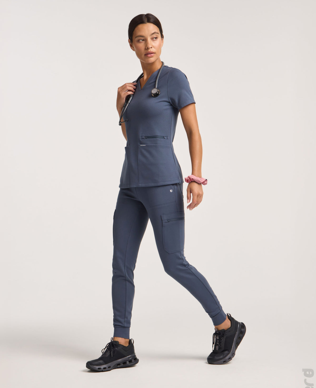 Jaanuu Kass Slim 4-Pocket Scrub Top in Carbon Gray, product photo 1 of 6