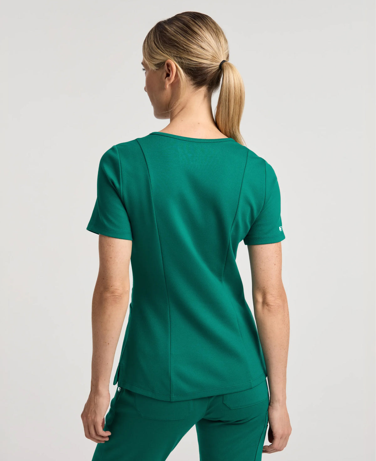 Jaanuu Kass Slim 4-Pocket Scrub Top in Hunter Green, product photo 6 of 6
