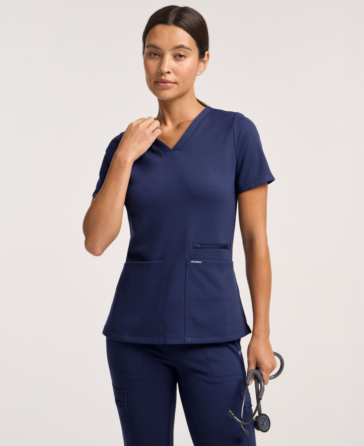 Jaanuu Kass Slim 4-Pocket Scrub Top in Midnight Navy, product photo 1 of 6