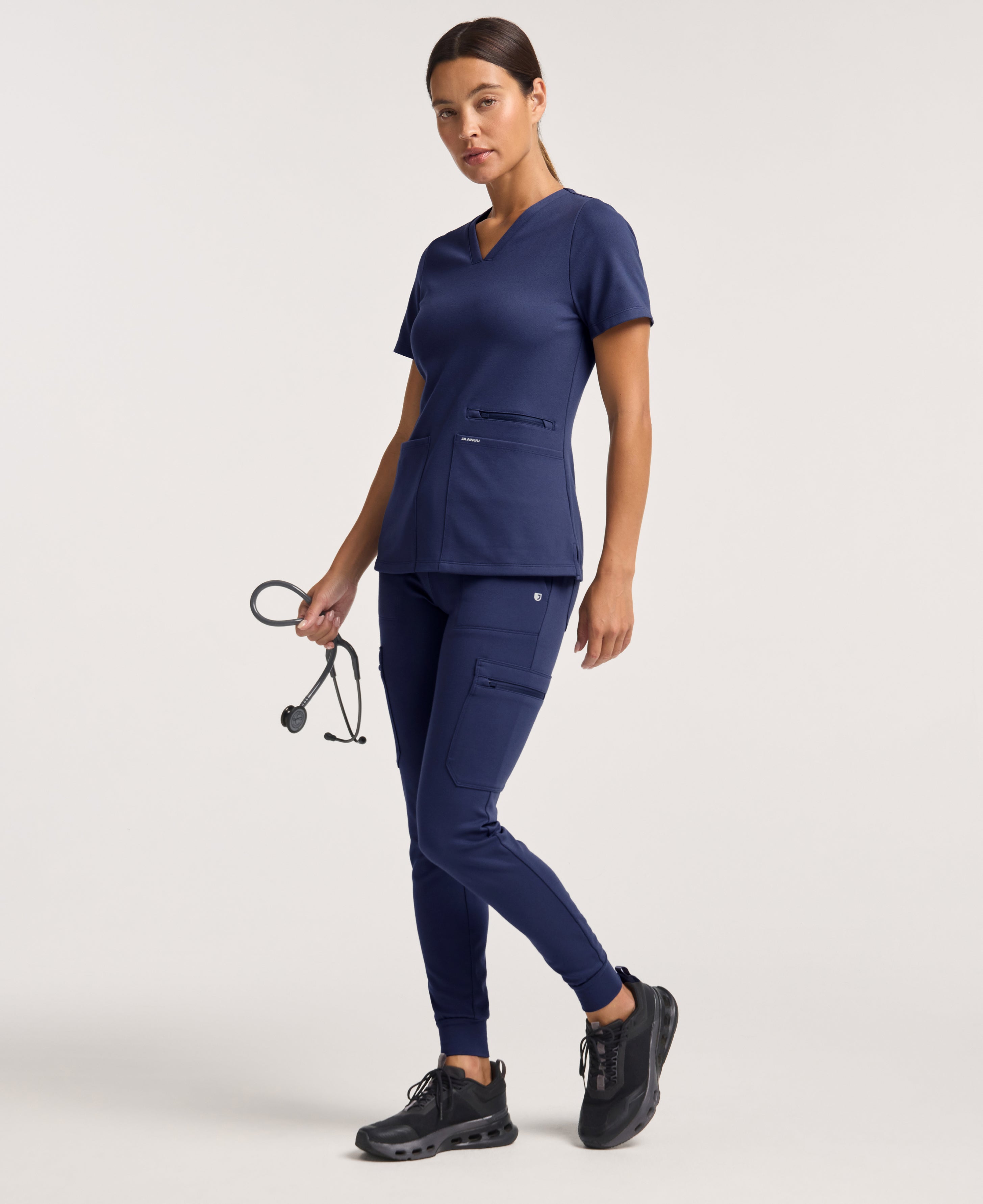 Jaanuu Kass Slim 4-Pocket Scrub Top in Midnight Navy, product photo 4 of 6