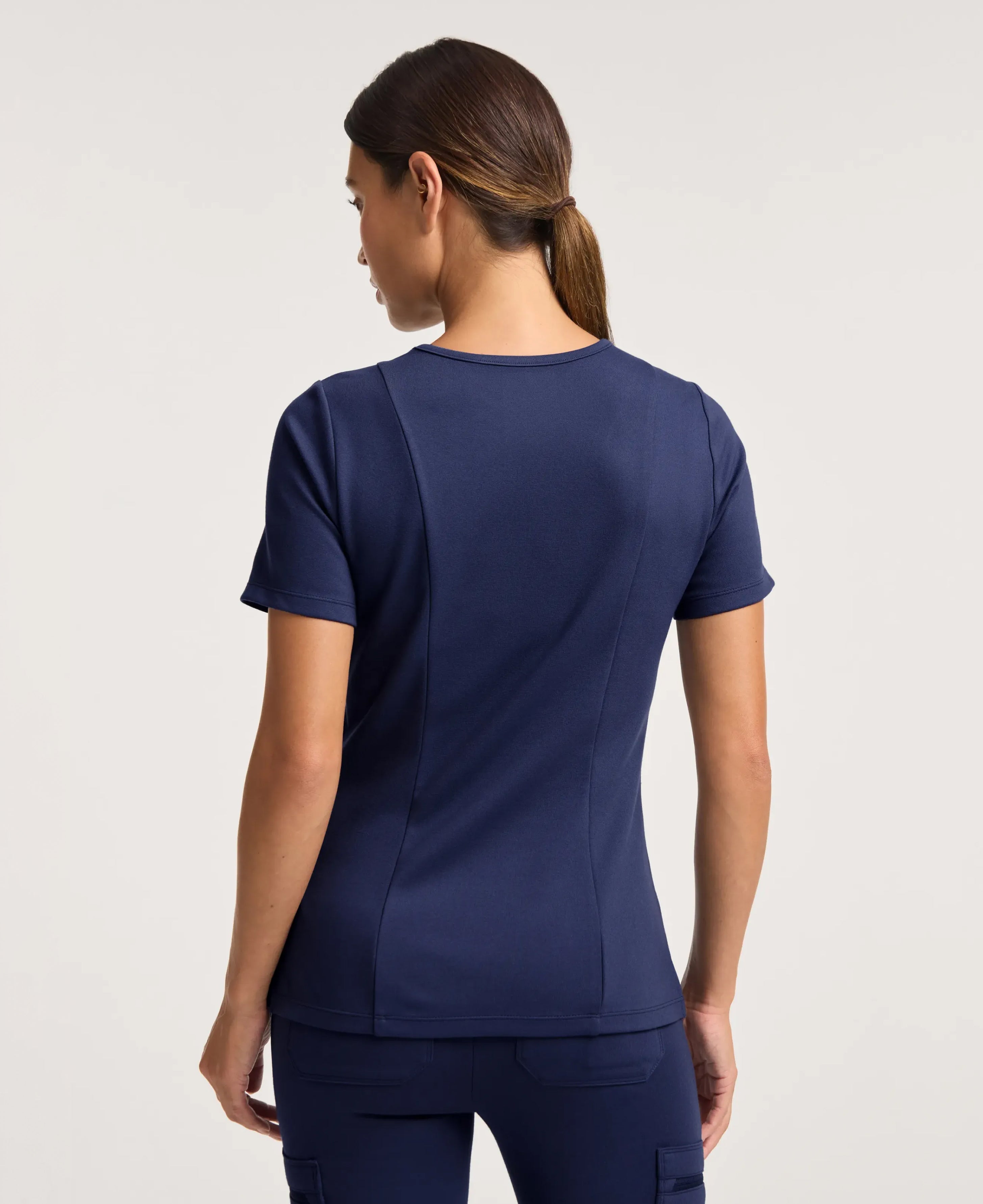 Jaanuu Kass Slim 4-Pocket Scrub Top in Midnight Navy, product photo 5 of 6
