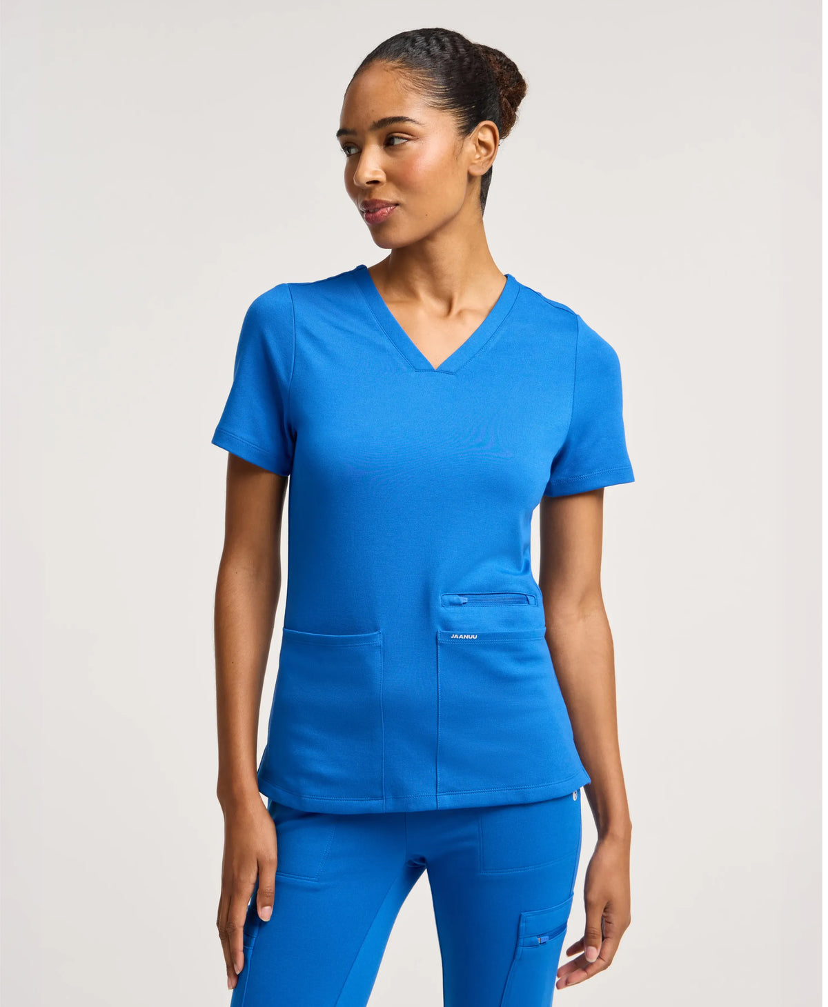 Jaanuu Kass Slim 4-Pocket Scrub Top in Royal Blue, product photo 1 of 6