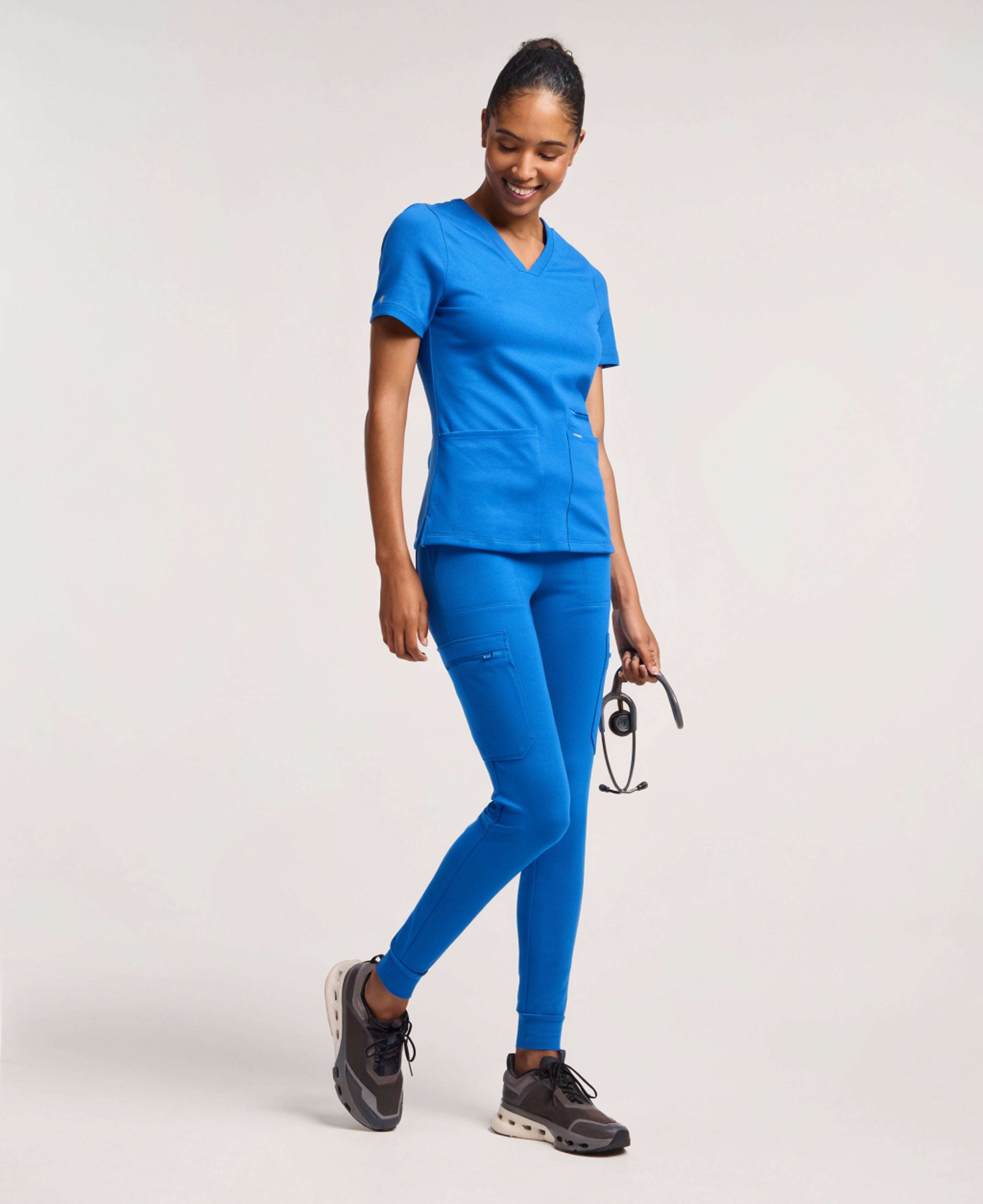 Jaanuu Kass Slim 4-Pocket Scrub Top in Royal Blue, product photo 4 of 6
