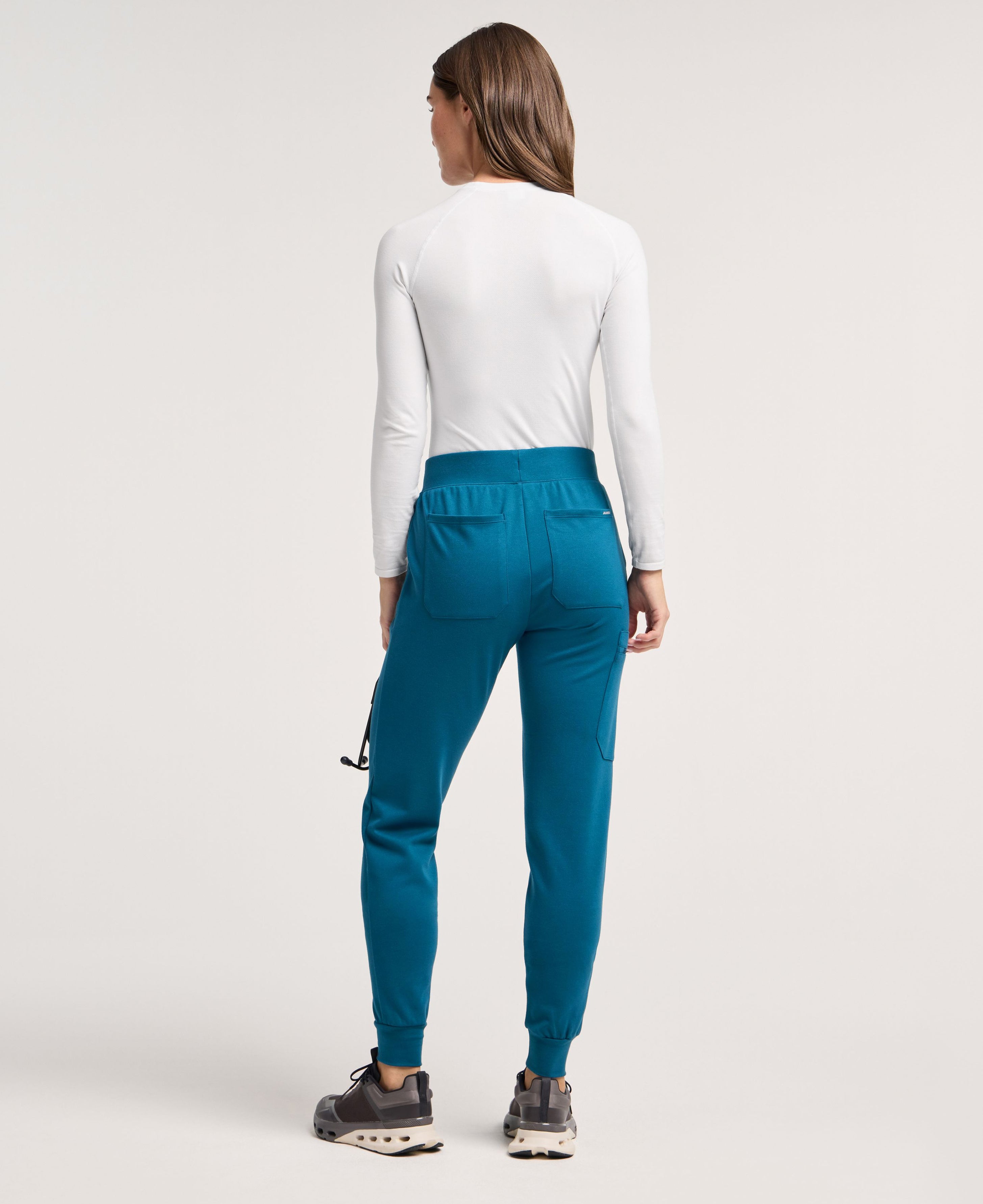 Jaanuu Rubi Slim Scrub Jogger in Caribbean Blue, product photo 5 of 6