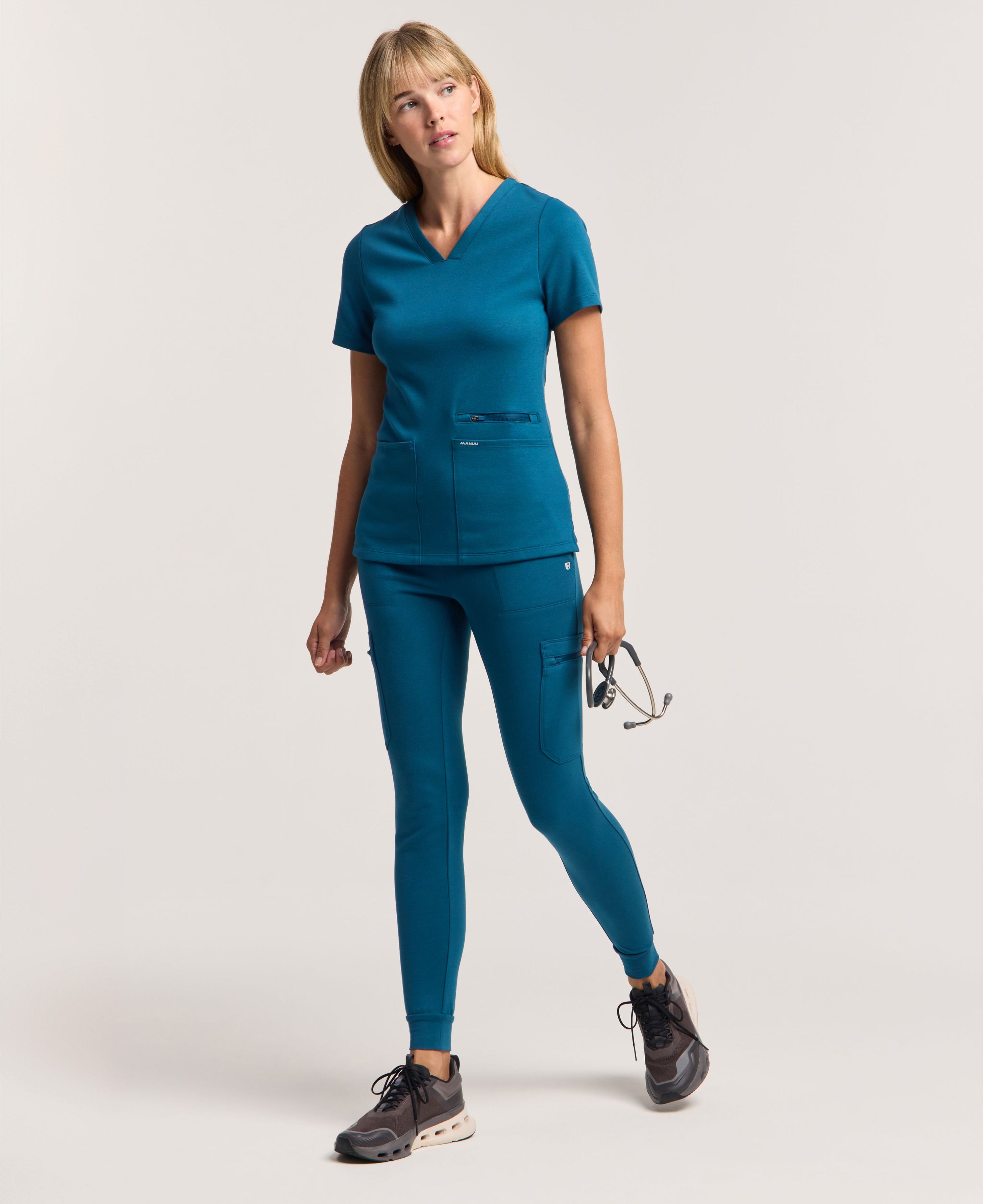 Jaanuu Kait 10-Pocket Skinny Scrub Jogger in Caribbean Blue, product photo 1 of 6