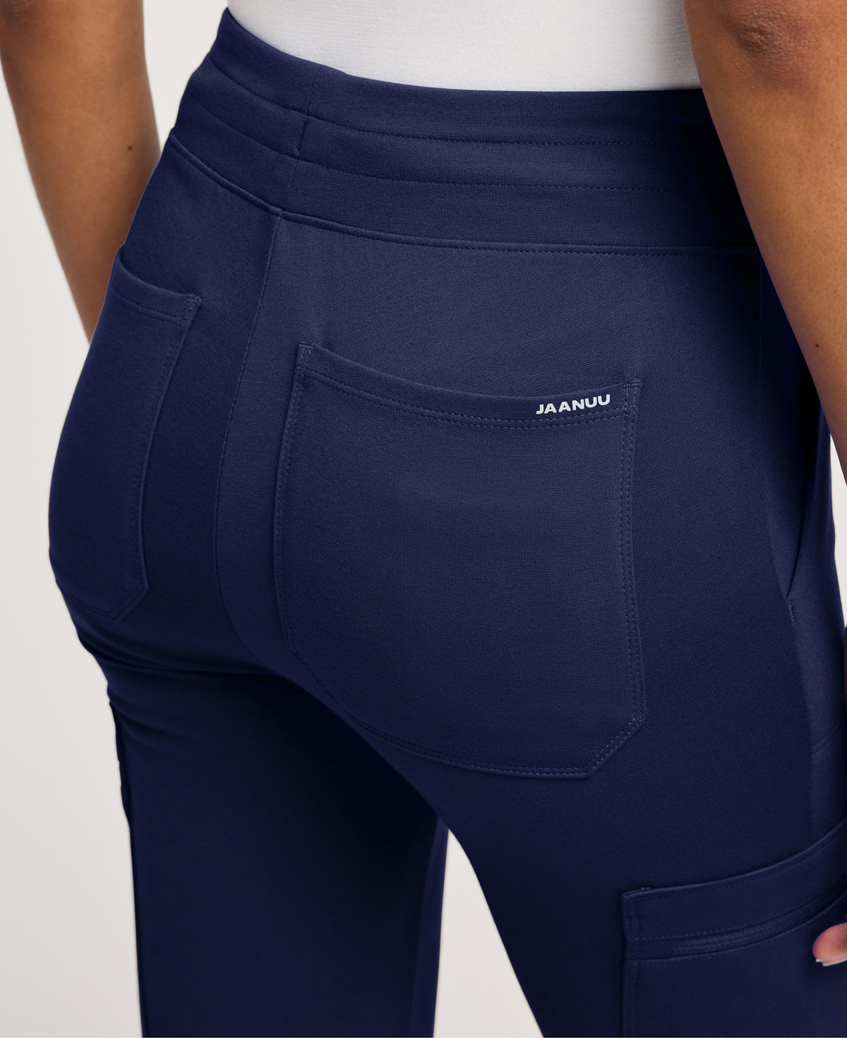 Jaanuu Kait 10-Pocket Skinny Scrub Jogger in Midnight Navy, product photo 2 of 6