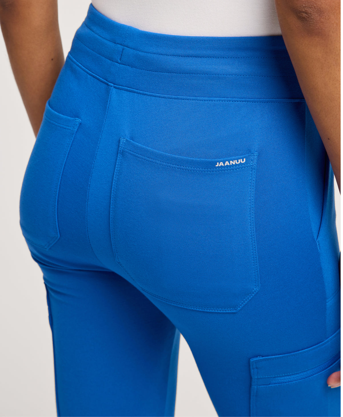 Jaanuu Kait 10-Pocket Skinny Scrub Jogger in Royal Blue, product photo 1 of 6