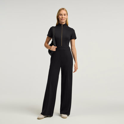 The UltraSOFT® Scrub Jumpsuit - Black + Gold Zip